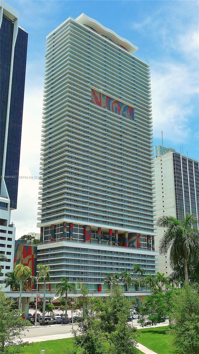Featuring a very low interest rate ASSUMABLE MORTGAGE !!, this breathtaking high-floor residence offers an exceptional opportunity in the heart of Downtown Miami.

Perched on the 41st floor, this fully renovated home showcases sweeping, unobstructed views of Biscayne Bay, the Port of Miami, and the city skyline through floor-to-ceiling windows and a stunning wraparound balcony. Inside, enjoy wide-plank flooring, a sleek open kitchen with warm wood cabinetry, black granite countertops, and stainless steel appliances, along with spa-inspired bathrooms designed with refined, modern finishes.

Set within one of Miami’s most iconic full-service buildings, residents enjoy luxury amenities including an infinity-edge pool, expansive fitness and spa facilities, club rooms, and 24-hour concierge—all just steps from Bayfront Park, world-class museums, dining, and entertainment.

Downtown living at its finest—elevated, effortless, and unmatched.