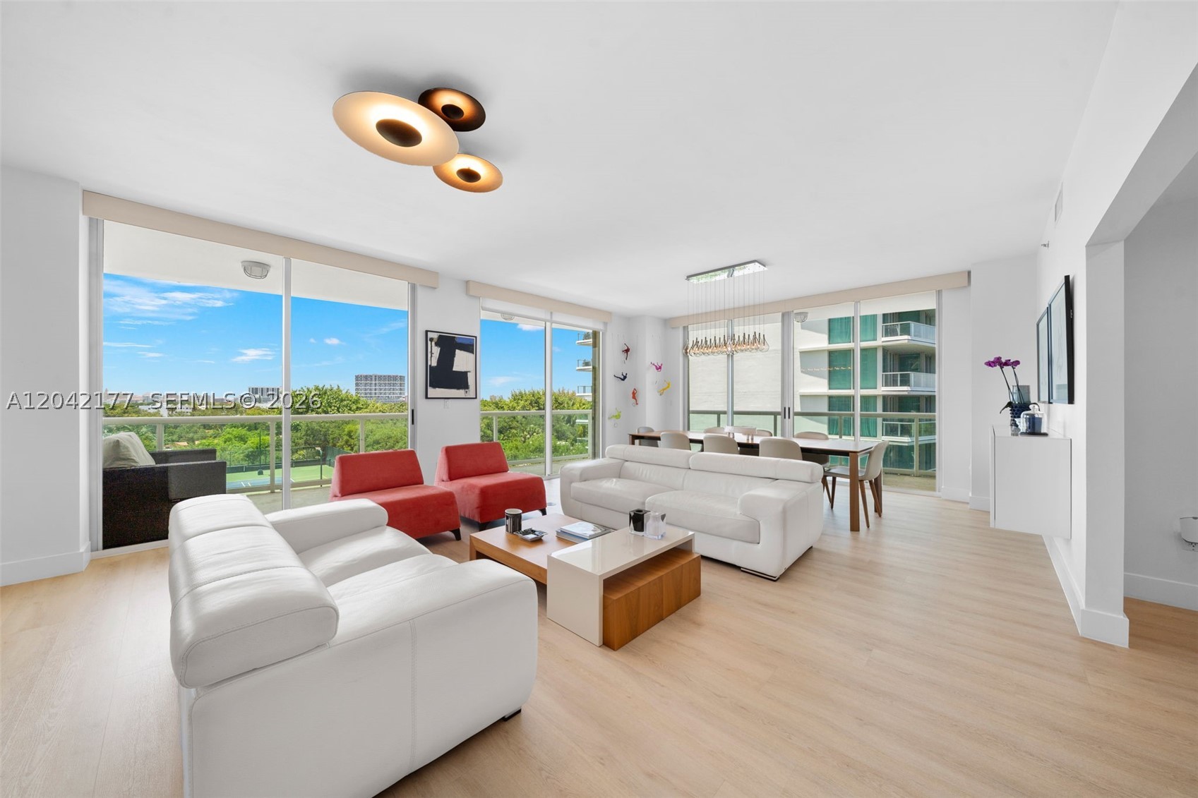 Rarely available 2-bedroom plus den, 2.5-bath residence in Grove Hill, one of Coconut Grove’s most sought-after boutique buildings. The home offers a bright, open layout filled with natural light, impact windows throughout, and almost 2,000 interior SF to enjoy. The unit features many upgrades: newer floors, added storage and oversized pantry, new doors, an eat-in kitchen with extra freezer space, renovated baths, built-out closets and automatic shades in every room. Enjoy a large wraparound terrace accessible from every room, creating seamless indoor-outdoor living, with the living and dining areas flowing directly onto the terrace. Both bedrooms are generously sized with en-suite baths and ample closet space. The unit also includes 2 assigned parking spots. Enjoy a resort-style lifestyle with 24-hour security, concierge and valet, a heated lap pool, fitness center, tennis, pickleball and basketball courts, community room, BBQ area and children’s playground. All this just moments from Cocowalk, restaurants & shopping, parks, marinas and top public and private schools. FURNITURE CAN BE INCLUDED.