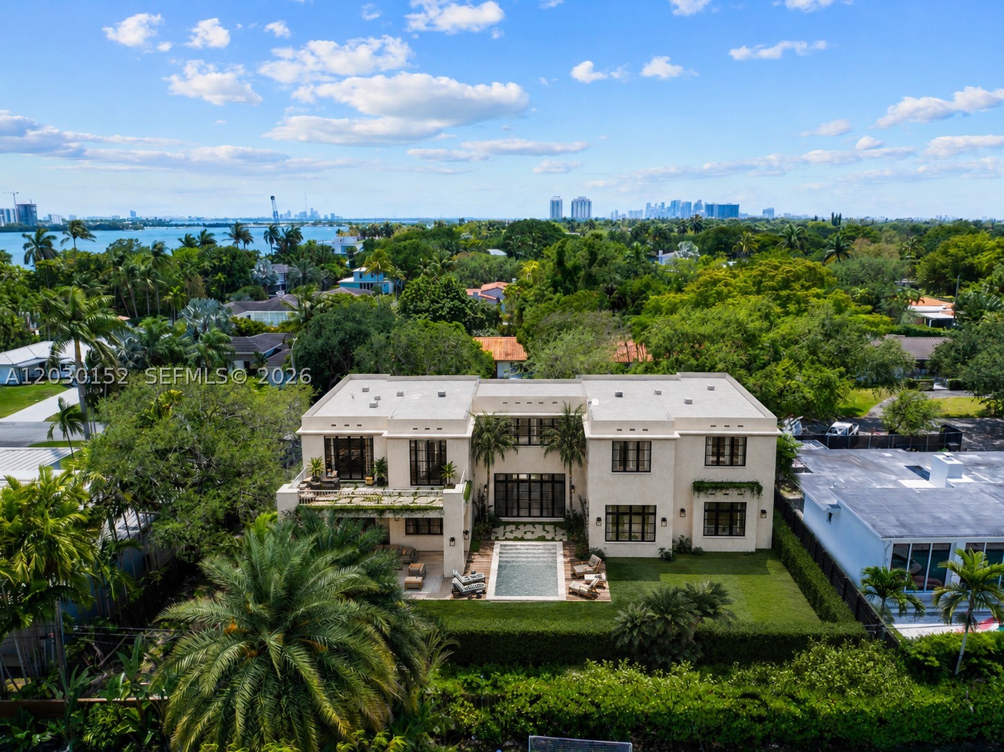 Set on an oversized 12,262 SF lot east of Biscayne Blvd in Miami Shores, Nobel House is a rare, custom new-construction residence where architectural intention and family livability come together at scale. Its approximately 5,650 square feet of thoughtfully planned space includes four bedrooms, four full baths, one half bath, a private office, family room, upper living lounge, in-home sauna, cold plunge, gym, heated pool, large covered terrace, and two garages for up to three cars.
The opportunity here is distinctive: buyers can purchase at this stage of construction and personally shape select finishes and details through a curated customization process — stepping into a sophisticated design vision while still making it their own. Interiors are planned with European oak flooring, rich marble surfaces, custom millwork, designer wall treatments, and a chef's kitchen featuring Lacanche, Wolf, and Sub-Zero appliances.
Every element of the bedroom program reflects the same level of care. The primary suite offers a generous private balcony, a 280 SF walk-in closet, a separate dressing room, and an elegantly appointed bath. Each secondary bedroom includes a large closet and en-suite bath, with no shared arrangements or wall, and complete privacy. The home is designed by Stephanie Harroch of XID Design & Build, whose career spans Richard Meier, Daniel Libeskind, and Handel Architects. Delivery anticipated Q3 2027.