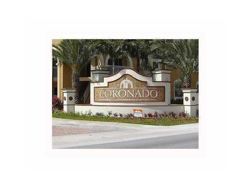 EXCELLENT LOCATION, CITY OF DORAL, EXCELLENT CONDITION, READY TO MOVE IN! PB LIVING ROOM AND WOOD HALLWAYS AND BEDROOMS. TILE IN KITCHEN. GRANITE COUNTER TOP. LAKE VIEW, NEAR TRANSPORTATION.