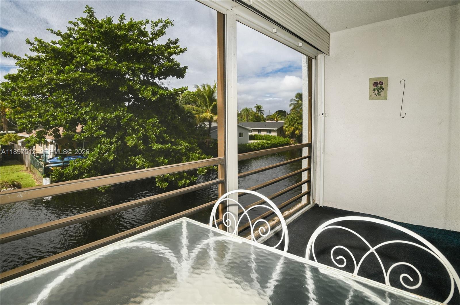 This 2-bedroom, 2-bathroom condo in the heart of Oakland Park offers a spacious & inviting living space. The unit is flooded with natural light from its large, screened-in patio, providing a serene & beautiful view of the canal. Nestled within a 24/7 gated community, the condo boasts beautiful grounds and is surrounded by several parks. The community amenities are extensive, including pools, exercise rooms, car wash area, BBQ areas, clubhouse, laundry rooms, and so much more. Additionally, two pets are permitted per unit. No rentals permitted during the first two years of ownership. The condo is conveniently located near downtown, beaches, shopping & transportation, making it an ideal choice for those seeking a resort-style lifestyle. Unit can be sold furnished or unfurnished. A Must See!!