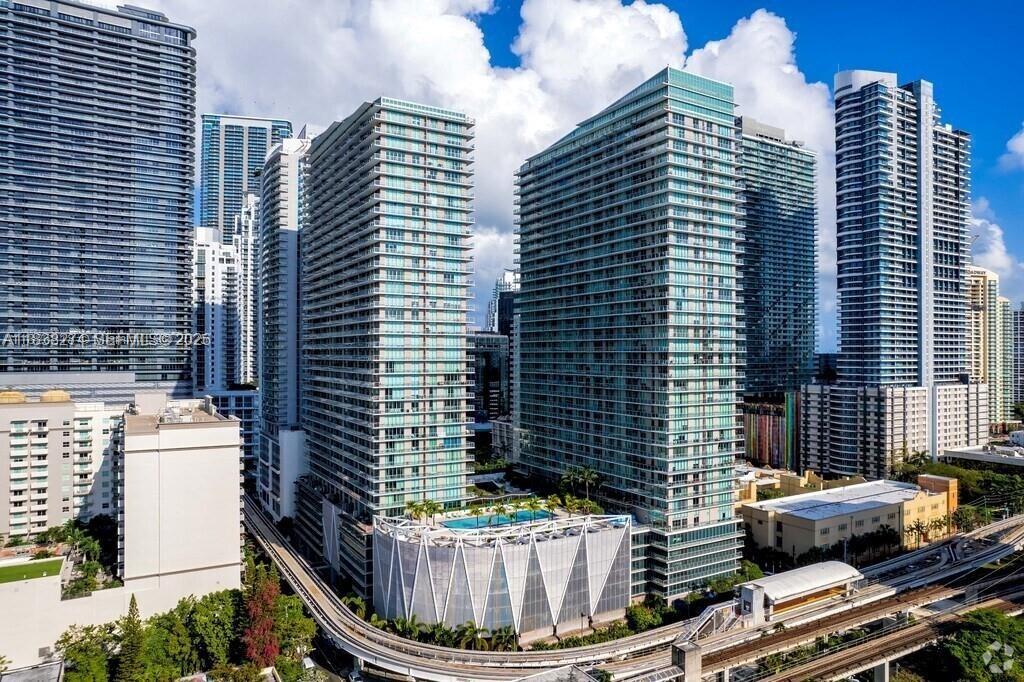 Experience the best of Brickell living in this beautifully designed 2-bedroom, 2-bathroom unit featuring breathtaking city views and floor-to-ceiling impact windows. Each room offers direct access to a spacious balcony through sliding glass doors, creating a seamless indoor-outdoor flow. Located in the heart of Brickell, this unit is just steps away from Brickell City Center, restaurants, shopping, and entertainment. Enjoy the convenience of nearby Metrorail and Metro mover stations. The building offers amenities like two pools, a fully equipped gym, a BBQ area, a children's playroom and game room, a relaxing spa, and a hot tub. Valet Parking for guests!! Allows minimum 30-day Leasing. A perfect combination of comfort and convenience. This is Brickell living at its finest!! Seller willing to pay for the Special Assessment!