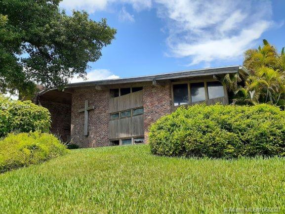 Development Opportunity!  A religious facility owned and occupied by Sunset Congregational Church since 1975.  Situated on a beautiful 2.5 acre site on Sunset Drive, this property is truly one-of-a-kind.  This is an as-is sale, with inspections welcome.  Please note that the property has not been platted, and the underlying zoning is RU-1