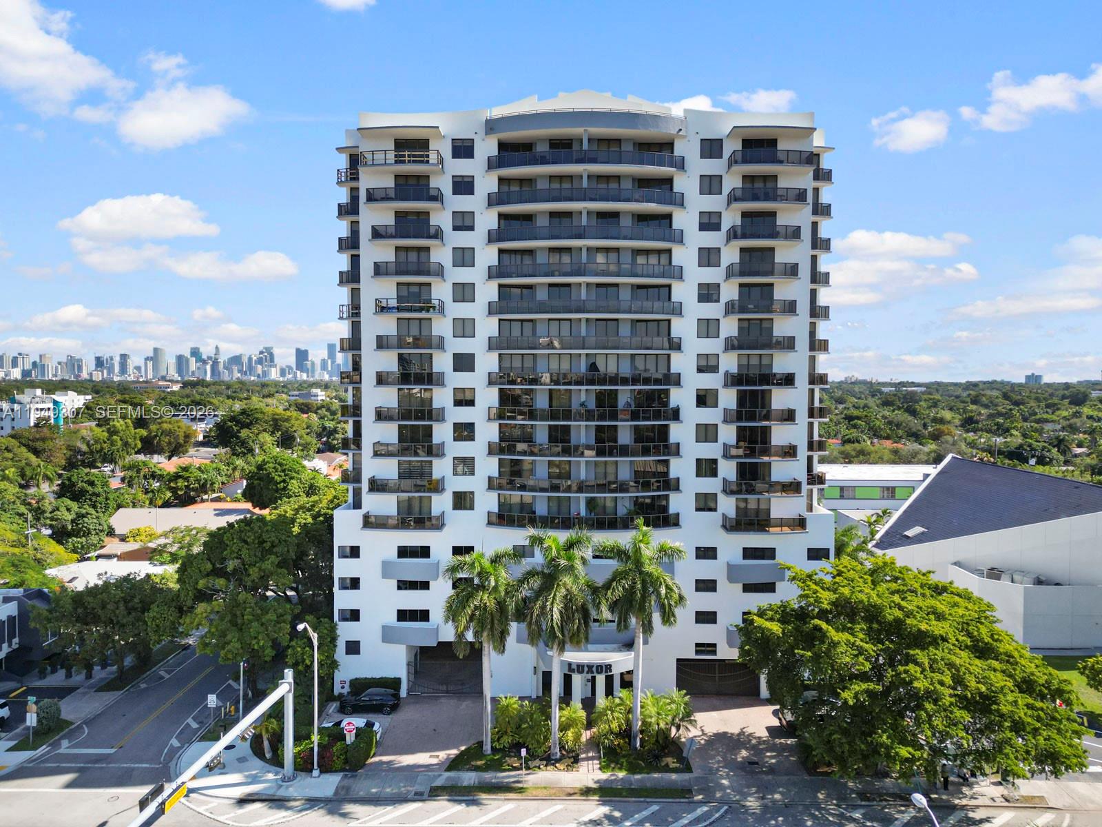 Million $$ views at half the price! Add to that location, and you have a winning combination!! This spacious 2/2 is nestled between Coral Gables, Coconut Grove & Downtown Miami/Brickell area. The unit offers a comfortable split plan, tile and laminate flooring throughout, W/D in unit, 3 balconies (one is a huge covered terrace), and 2 deeded side by side garage parking spaces. Enjoy your morning coffee on one of the balconies as you catch amazing sunrises. Then finish your day with some spectacular moon risings over Biscayne Bay and the Miami skyline! Pictures don't really capture it. Come see for yourself, you won't be disappointed. Building amenities include a pool, gym, and secured entry w/security cameras.