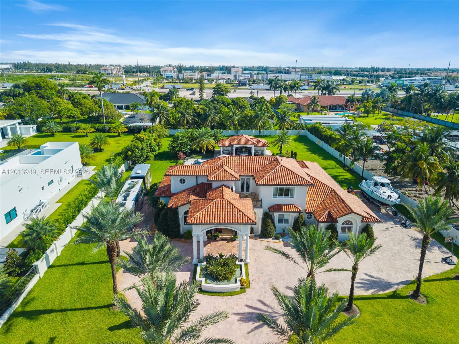SELLER MOTIVATED!!! Welcome to this contemporary architectural jewel located in one of the most exclusive areas of Hialeah Gardens. This impeccable design residense offer 5 bedrooms, 4 bathhrooms high ceilings and open layout that maximizes natural light and panoramic views. Gourmet Kitchen with state of the art appliances with summer kitchen in the backyard and beautiful pool. Built with the highest quality standards and luxury finishes, this property combines modern elegance with functionality. Enjoy absolute privacy of a dead- end street with no neighbors on one side. A unique property for those looking for the best lifestyle and comfort.