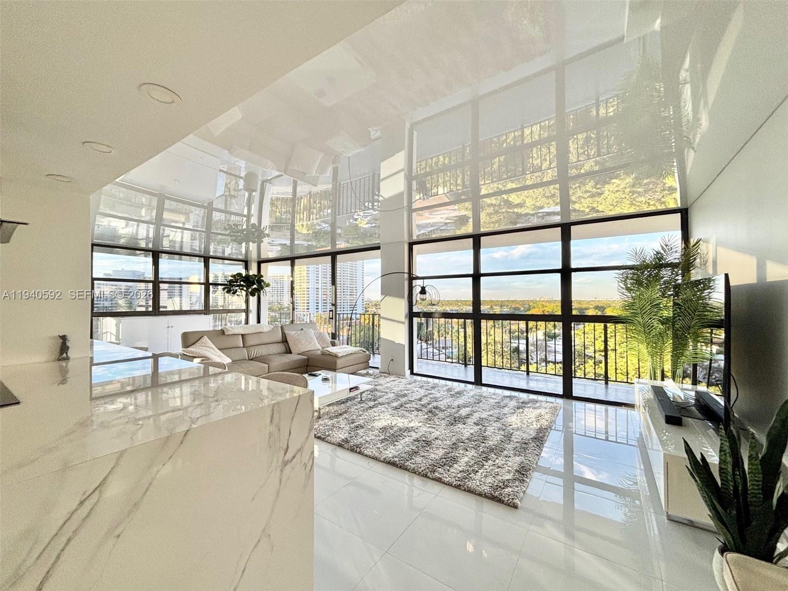 This is a WOW unit!! Stunning large corner unit condo on the Intracoastal with breathtaking southwest views and a sun-drenched wraparound balcony—perfect for enjoying spectacular sunsets. This highly upgraded residence features porcelain tile flooring throughout, a sleek modern kitchen with upgraded cabinetry, contemporary countertops, and high-end appliances, all complemented by a striking reflective ceiling that enhances the open, elegant feel.
The spacious layout includes an in-unit washer and dryer and a versatile den with a window that can easily be converted into a third bedroom. Rarely available, this unit also comes with two deeded parking spaces, a highly sought-after convenience.
Enjoy resort-style amenities including a heated Intracoastal-front pool, fitness center, tennis courts, game room, and more—bringing luxury living and an active lifestyle together in one exceptional location. Furniture is also available.