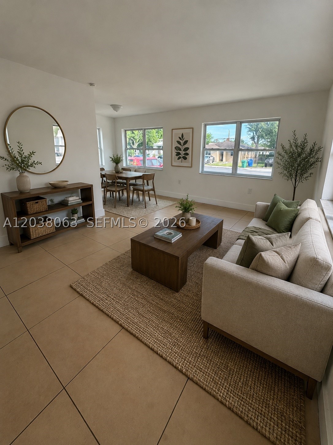 Charming and well-maintained front unit of a duplex offering 2 bedrooms and 1 bathroom in a highly desirable location. This partially remodeled residence features a spacious and functional floor plan with an oversized living room, separate dining area, and generously sized bedrooms. Recent upgrades include brand-new mini-split A/C systems throughout, new high-impact windows, a new electric water heater, and fresh interior paint. The property has been meticulously maintained and provides a comfortable, move-in-ready living experience. Enjoy access to a shared backyard, with shopping, restaurants, schools, public transportation, and major highways just minutes away. Available immediately and easy to show.