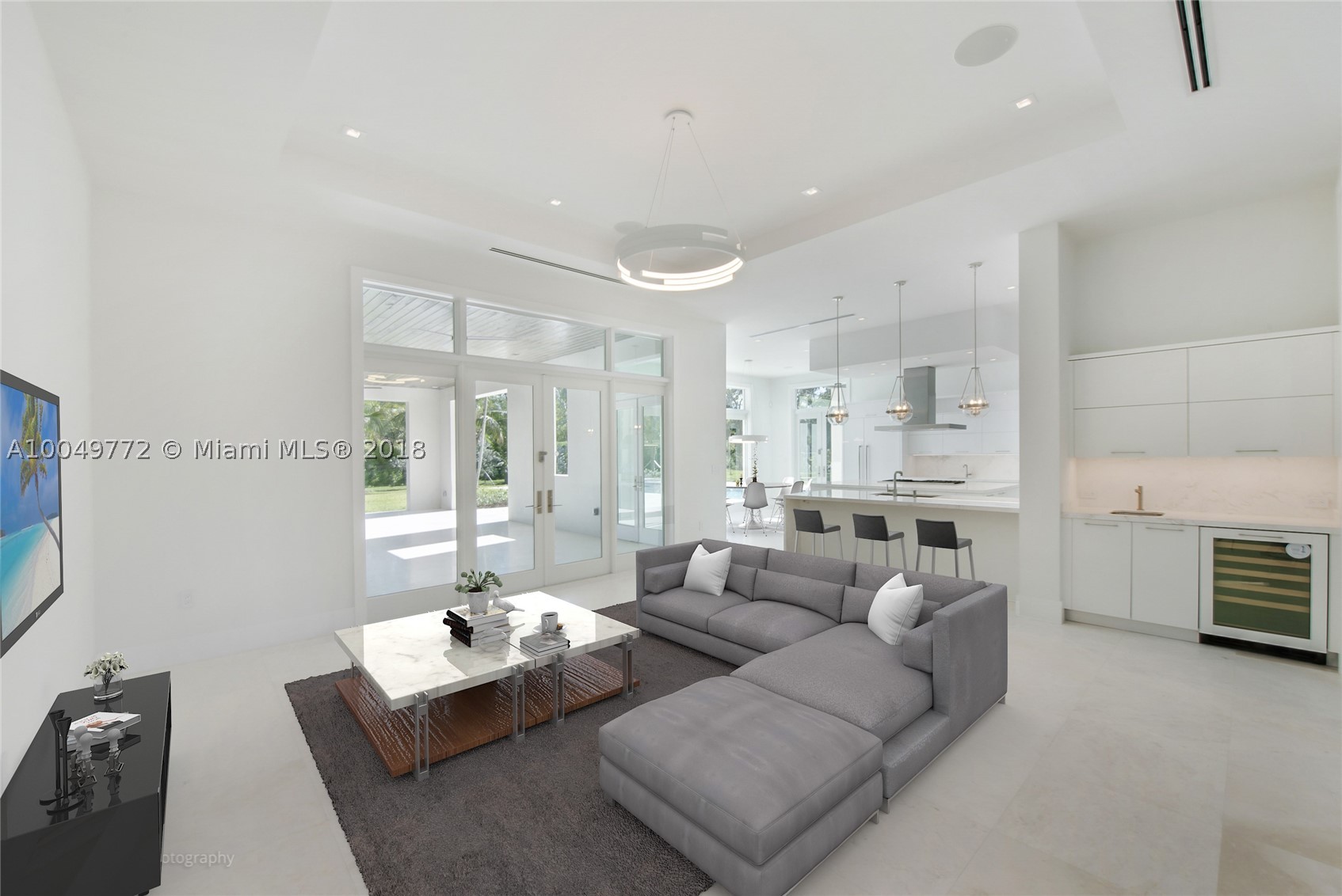 Timeless Contemporary Hollub Homes New Construction in most sought after North Pinecrest location. 5 ensuite bedrooms, mother of pearl guest bath and 4 car garage. Finest finishes including marble mosaics, custom cabinetry, marble floors, large pool, covered terrace and complete summer kitchen. Entertaining inside and out. Bring your pickiest buyers with an eye for excellence. Elevator, Surround Sound, Chefs Kitchen much more. Ready to move in!