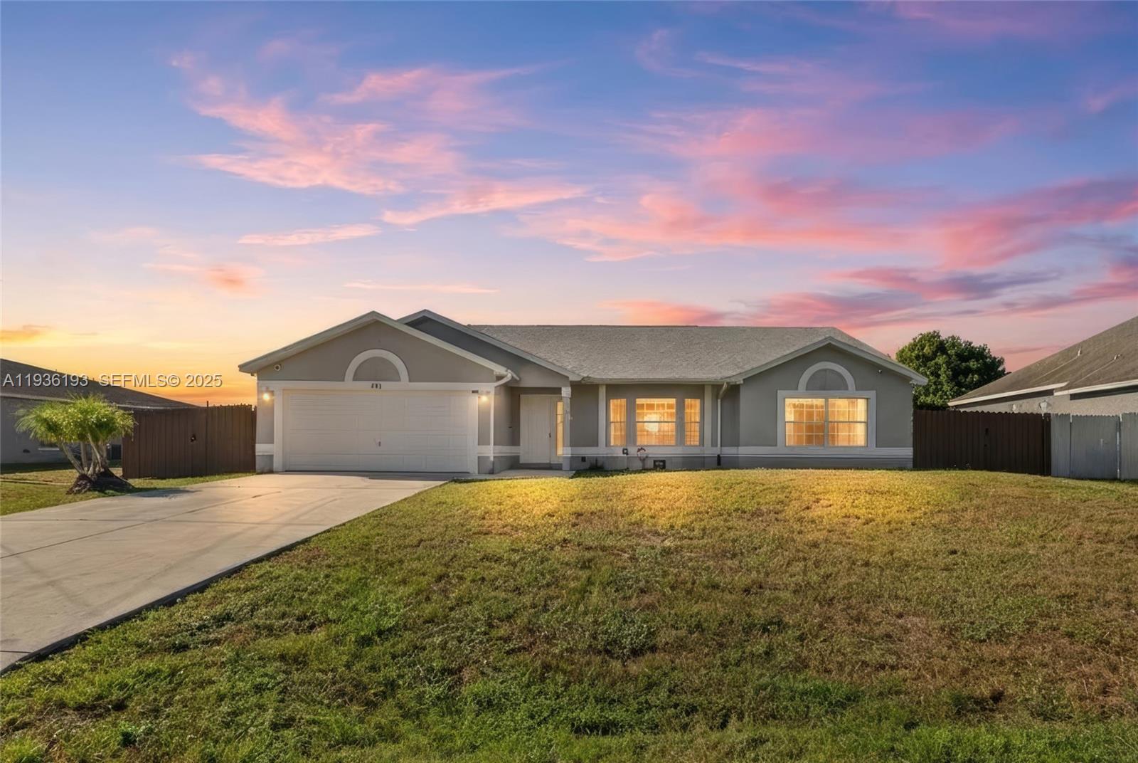 Welcome to this beautifully maintained 3-bedroom, 2-bath home located in the heart of Port St. Lucie. Offering approximately 1,900 square feet of living space, this single-story residence features a highly desirable split floor plan and an open-concept layout perfect for both everyday living and entertaining. The kitchen is a true centerpiece, showcasing rich cherry wood cabinetry, granite countertops, stainless steel appliances, a pantry, and an oversized island ideal for cooking, gathering, and hosting. Vaulted ceilings and tile flooring throughout enhance the home’s bright, airy feel. The spacious primary suite offers a private retreat complete with a large walk-in closet and a generous en-suite bathroom. Step outside to enjoy Florida living at its best with a screened-in patio overlooking a massive, fully fenced backyard - perfect for relaxing, pets, or future outdoor enhancements. Additional highlights include NO HOA, 2022 Roof, 2020 A/C, and 2022 water heater, providing peace of mind for years to come. Conveniently located just minutes from shopping, dining, schools, parks, and major highways. This home truly checks all the boxes - schedule your private showing today!