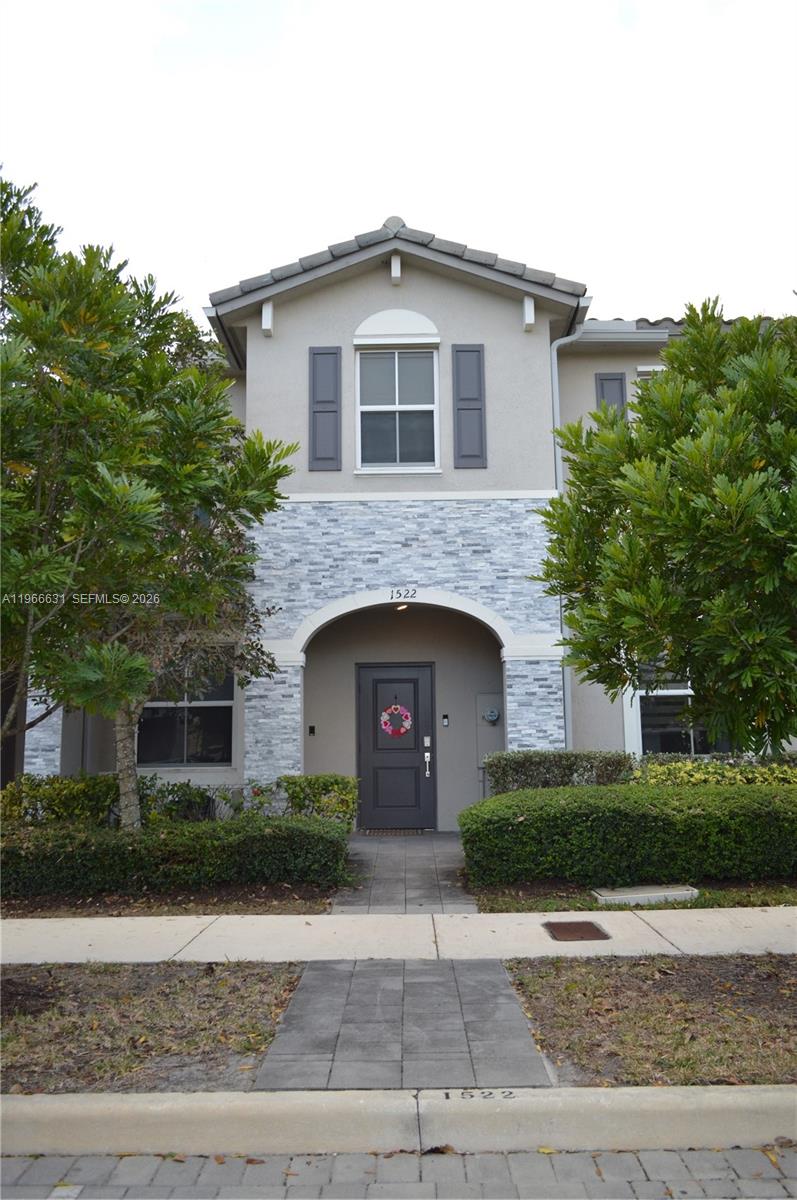 JUST REDUCED! Motivated Seller! 3% SELLER CREDIT. Welcome to this beautifully maintained 3-bedroom, 2½-bath townhome in Homestead, Florida, built in 2020 with award-winning design for comfortable, modern living. Nestled in a quite corner location and no backdoor neighbors. Ideally located just minutes from the Florida Turnpike, this home offers easy access to shopping, dining, and local hospitals—plus you’re only about 20 miles from the breathtaking waters of the Florida Keys.

This two-story split-level layout features spacious living areas filled with natural light, creating the perfect space for both relaxing and entertaining. The kitchen and living areas flow seamlessly to a generously sized private patio—ideal for weekend gatherings or quiet evenings outdoors.

Enjoy added value and peace of mind with a new water softener system and reverse osmosis filtration system, enhancing comfort and water quality throughout the home. The property also includes two dedicated parking spaces for convenience.

Residents enjoy access to outstanding community amenities, including a resort-style pool and spa, cabanas, elegant clubhouse, fully equipped fitness center, and scenic lakes—offering the perfect blend of relaxation and recreation right outside your door. All for a very low monthly HOA of $238 per month!

Move-in ready and meticulously cared for, this townhome combines location, upgrades, and lifestyle—making it the perfect place to call home.