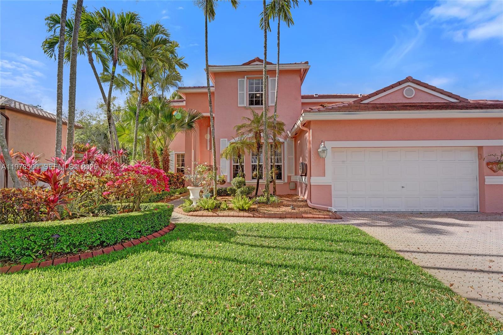 Windsor Palms-the Best Kept secret in West Miramar!!! Welcome to this stunning executive home in a sought-after, guard-gated community. This 5-bedroom, 3.5-bathroom gem sits on a spacious 12,140 sq ft lot with no back neighbors, offering privacy and tranquility. Enjoy a newer roof (2024) and new pipes/plumbing 2023. The first floor features a formal living rm, dining rm and separate family room. Large, eat-in kitchen with center island, double oven, 2 sinks and pantry. A private bedroom w/ensuite on ground floor, laundry room w/newer washer & dryer (2024) storage cabinets and sink. The elegant staircase with the Juliette style balcony overlooking the downstairs is a designers dream. The second floor boasts a luxurious primary suite with a sitting room, 2 large walk-in closets and a separate work area (or can be a dressing area). Primary bath has his/her sinks, jacuzzi tub, shower and bidet. Another 3 beds and bath complete the upstairs (one room is used as office with built in cabinets). Lots of closets and storage space throughout.  Large, private yard with no back neighbors, beautiful landscaping, 2 covered patios, accordion hurricane shutters & a front view of the lake. Close to I-75 and turnpike, restaurants, shopping and schools. Memorial west Hospital -less than 10 min, 25 min to beaches, 20 minutes to Miami, 30 minutes to airports..