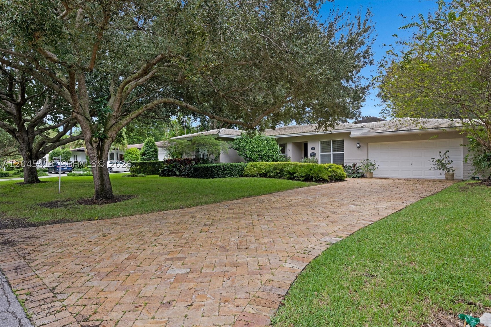 Experience the timeless charm of Coral Gables in this beautifully maintained 3-bedroom, 2-bath residence, ideally situated between the iconic Biltmore Hotel and Riviera Country Club. This inviting home features an updated kitchen with modern appliances, abundant cabinetry, a walk-in pantry, and a cozy fireplace that adds warmth and character. The spacious primary suite offers two generous walk-in closets, while the two-car garage provides ample storage and convenience. Enjoy a lush, private backyard with an expansive patio, perfect for relaxing, entertaining, or simply enjoying South Florida living. Offered unfurnished and available for immediate occupancy, this exceptional residence is available for a minimum 6-month lease or longer, making it an ideal choice for University of Miami faculty, visiting professors, graduate students, medical professionals, corporate relocation clients, executives on temporary assignment, or anyone seeking the comfort and prestige of a Coral Gables address. Conveniently located just minutes from the University of Miami, premier hospitals, world-class dining, shopping, parks, and major roadways. Schedule your private showing today and experience one of Coral Gables’ most desirable rental opportunities