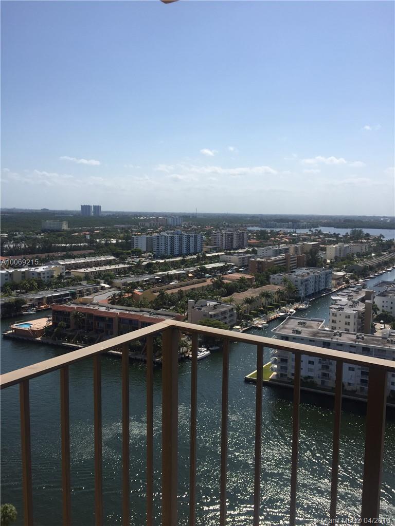 GREAT VIEW OF INTER COASTAL AND DOWN TOWN -- MIRRORS  IN LIVING AND DINNING --NEW CARPET IN BEDROOMS--LIVING ROOM TILED --JUST PAINTED -- READY TO MOVE IN -- IN THE HEART OF SUNNY ISLS