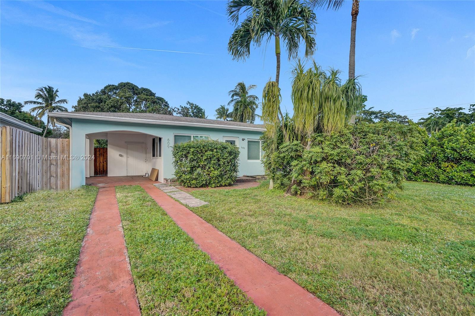 Home has 14'11" X 20'3" a very large extra family/sunroom/game room inside the home. all new impact windows and doors, new California Blinds throughout including sun shield and blackout in sunroom. new 3-ton AC with heat installed, owner keeps up on maintenance with termite tenting, landscape- tree trimming, Carport and fenced yard, great location near downtown, las Olas, International Airport and and beach. Lot size 60' X 135' great yard
- in pictures see floor plan