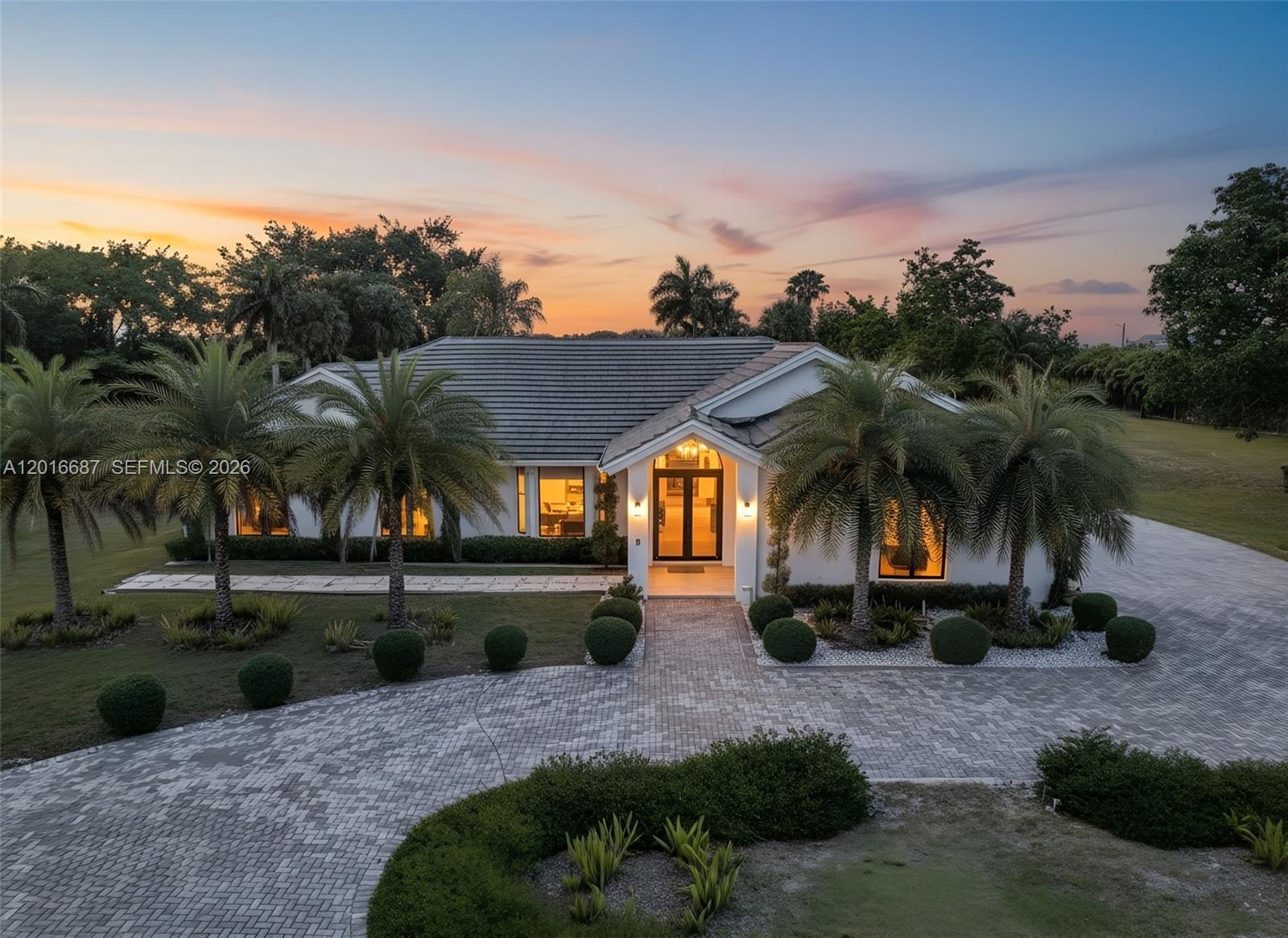 Welcome to one of Miami’s most unique aviation estates in the exclusive private airpark community of Lindbergh’s Landing. Situated on more than 5.6 acres, this fully remodeled 5 bedroom, 3 bathroom residence offers a rare opportunity to live where your aircraft can land just steps from your backyard. Featuring direct access to the community’s private runway and aircraft parking capability on the property itself, this is true fly in, fly out living.
Designed for both luxury and functionality, the home offers over 4,300 SqFt of living area with soaring natural light, porcelain flooring, impact Smart Film windows and doors, custom cabinetry, a newer roof, and expansive living spaces ideal for entertaining. The open layout flows seamlessly into a stunning outdoor setting complete with a resort style pool, lush landscaping, and peaceful panoramic views.
The flexible fifth bedroom is perfect for a guest suite, executive office, gym, or media room. Additional highlights include a UV water filtration system, circular driveway, RV and boat parking, and access to a lifestyle rarely available in South Florida. Enjoy privacy, open skies, and the tranquility of country style living while remaining within close proximity to Miami, executive airports, golf courses, equestrian trails, and major highways.
A truly rare offering for aviation enthusiasts, luxury buyers, and anyone seeking space, privacy, and a lifestyle unlike anything else on the market.