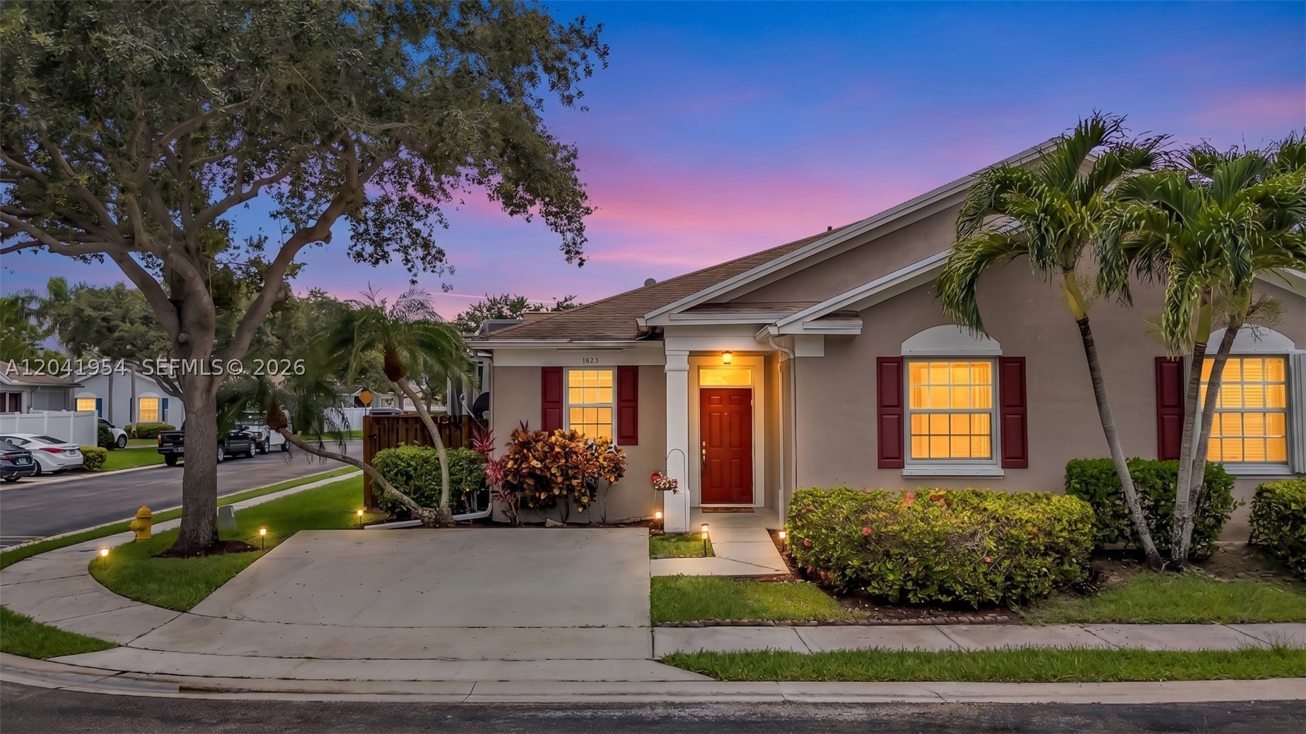 HIGHLY DESIRABLE PLUM HARBOR! THIS LARGER MODEL VILLA OFFERS 1,510 SQUARE FEET UNDER AIR. FEELS LIKE A SINGLE-FAMILY HOME WITH PRIVATE TWO CAR DRIVEWAY AND FENCED YARD. SPLIT FLOOR PLAN WITH POCKET DOOR FOR TRUE PRIVACY. END UNIT OFFERS LOADS OF NATURAL LIGHT THROUGHOUT. NEUTRAL TILE IN ALL LIVING AREAS AND LAMINATE FLOORING IN BEDROOMS. CUSTOM BUILT CLOSET SYSTEMS. BUILT IN DESK IN KITCHEN WITH SPACE FOR DINETTE TABLE. LIVING AREA OFFERS CUSTOM WAINSCOTTING AND MOLDING. FRESHLY PAINTED INTERIOR. BATHROOMS HAVE BEEN TASTEFULLY RENOVATED. PULL-DOWN STAIRS TO HUGE ATTIC PERFECT FOR STORAGE. A/C 2021. DOUBLE SLIDERS OPEN TO OVERSIZED SCREENED AND COVERED PATIO PERFECT FOR ENTERTAINING. ACCORDION SHUTTERS FOR SCREENED PORCH AND HURRICANE PANELS FOR REMAINING WINDOWS. LOW HOA COVERS INSURANCE, ROOF, RESERVES, EXTERIOR PAINT AND LAWN CARE. BEAUTIFULLY MAINTAINED COMMUNITY WITH SIDEWALKS. RAPID HOA APPROVAL. AMENITIES INCLUDE POOL, PICKLEBALL AND TOT LOT. WALK TO EXCELLENT SCHOOLS. CENTRALLY LOCATED AND CLOSE TO EATERIES, SHOPPING, HOSPITAL AND SAWGRASS EXPY. PERFECT FOR FIRST TIME HOMEBUYERS, EMPTY NESTERS LOOKING TO DOWNSIZE AND INVESTORS. THESE VILLAS DON'T BECOME AVAILABLE OFTEN SO GRAB THIS ONE WHILE YOU CAN!