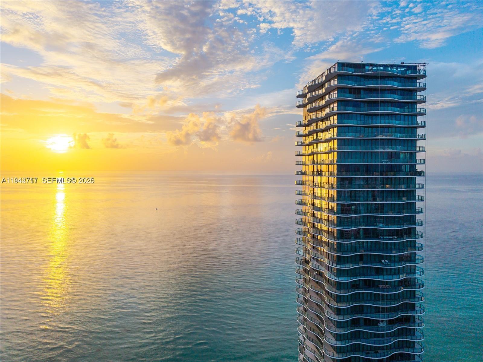 JUST REDUCED, priced for a quick sale! This FULL-FLOOR, oceanfront residence at Regalia Residences. This exquisite home offers the privacy and scale of a single family home combined with the services of a boutique, luxury, condominium. This all-glass residence features approximately 5,000 SF of interior living space and a 2,100 SF wraparound terrace with breathtaking 360 degree views of the Atlantic Ocean, Golden Beach, the Intracoastal Waterway, and the Miami skyline. Designed for entertaining, the expansive living and dining areas are wrapped in 10-ft floor-to-ceiling glass, filling the home with natural light and uninterrupted ocean vistas. Every room enjoys direct terrace access, creating seamless indoor-outdoor living throughout. 

The residence has been fully reimagined with no expense spared, showcasing river pattern marble slab finishes, smart lighting, automated window treatments and more! The chef’s kitchen features custom Italian cabinetry, exotic stone countertops, top-of-the-line Sub Zero & Miele appliances. The primary suite offers dual spa-style marble bathrooms, rain showers, soaking tub, and generous custom closets.  

Regalia offers full-service luxury amenities, including beach and pool service with cabanas, food and beverage service, 24/7 concierge, luxury spa, fitness and yoga studios, private wine cellar, business center, library, and children’s playroom—delivering an exceptional oceanfront lifestyle.
Offered fully furnished & curated by Artefacto.