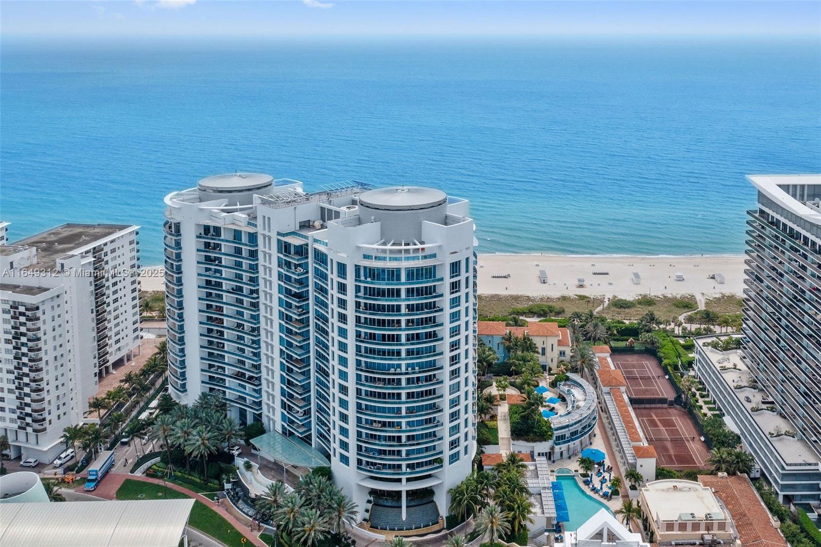 Bath Club - Rarely available PENTHOUSE.  Mansion in the Sky.  Experience the air and light of 11-foot ceilings.  The flow-thru design offers Ocean AND Bay terraces.  Large, dual walk-in closets and dual spa-like bathrooms in this re-imagined Primary suite. Top-of-the-line appliances, including Miele kitchen with full size Sub-Zero fridge & freezer.  Delight in the use of your private elevator foyer and the HUGE laundry room with separate service entrance.  Choose from the eat-in kitchen OR the formal dining area...the formal ocean view Living Room OR the bar area perfect for entertaining.  The Bath Club provides residents white glove service, state-of-the-art fitness center, full-service spa, clay tennis courts, beach/pool service, food/beverage service, 24-hour concierge valet and more...