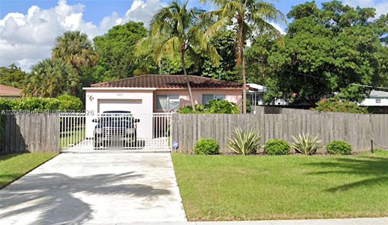Welcome to this beautifully maintained 1-bedroom, 1-bathroom home offering approximately 900 sq. ft. of comfortable living space. Nestled in a quiet neighborhood, this home is conveniently located near Barry University, Miami Shores, and just a short drive to Sunny Isles Beach.

The bright and spacious interior features abundant natural light, tile flooring throughout, central A/C and heating, stainless steel appliances, and an in-unit washer and dryer. The generously sized bedroom offers ample closet space, while the bathroom includes a relaxing tub/shower combination.

Enjoy the convenience of a private garage for secure parking and additional storage. Step outside to a fully fenced backyard, perfect for relaxing or entertaining. This charming home offers comfort, privacy, and an excellent location—don't miss this opportunity!