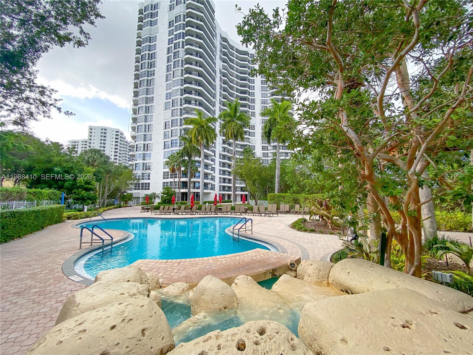 Beautiful lower penthouse unit overlooking the Turnberry Golf Course with a spectacular view! This unit features porcelain floors, an updated open kitchen with stainless steel appliances, and a spacious master bedroom with a walk-in closet. Amenities include tennis courts, a pool, jacuzzi, sauna, fitness center, game room, and more! Washer and dryer are included in the unit, along with covered parking. Conveniently located within walking distance to Aventura Mall and just minutes from the beach. The unit is currently leased until October 2025.