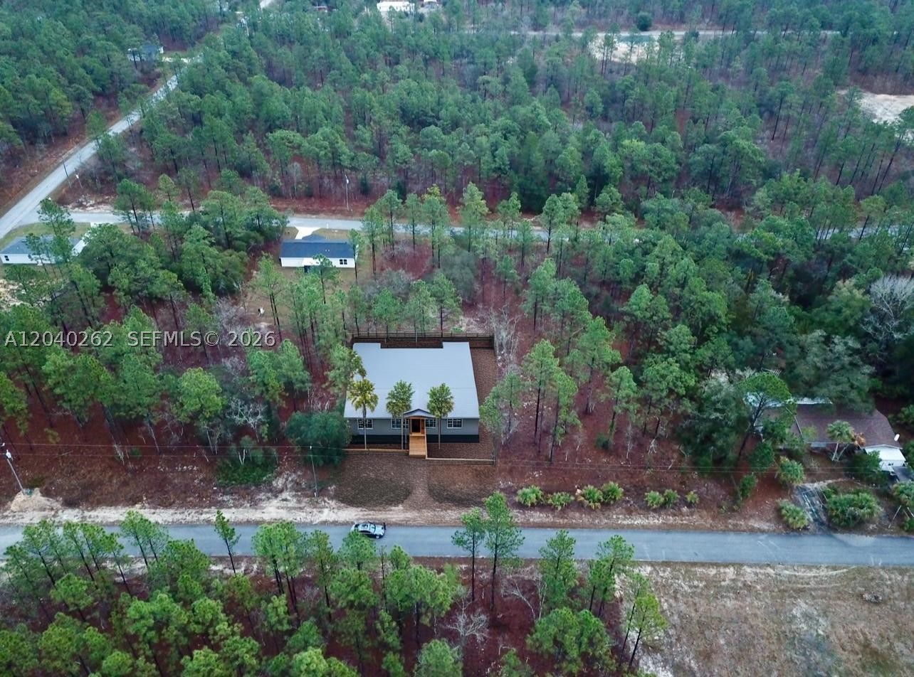 This 0.23-acre lot on Narcissus Rd in Rainbow Lakes Estates, FL, is a great opportunity whether you're looking to build your dream home or make a smart investment. With R-1 zoning, it's perfect for a single-family home, giving you plenty of space while still being close to everything you need. You're in a prime location just minutes from Rainbow Springs State Park, where you can enjoy crystal-clear springs, kayaking, and nature trails. Nearby Lakes Bonable, Little Bonable, and Tiger Lake offer great fishing and outdoor activities. you're a short drive to Dunnellon and Ocala, giving you easy access to shopping, dining, and essential services. No HOA, no deed restrictions, low property taxes. great buy whether you're ready to build now or hold for the future