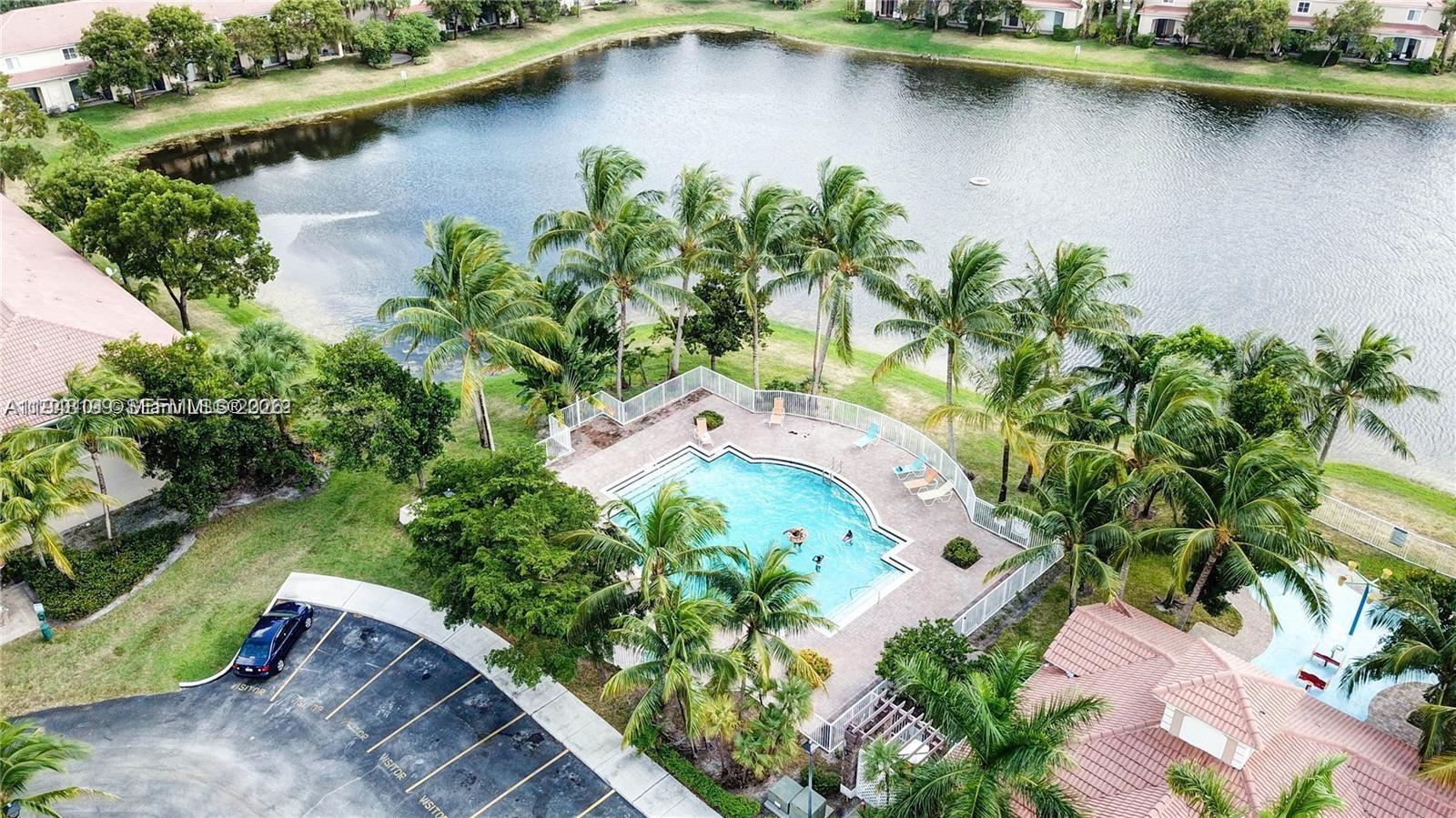 Spacious and cozy Townhouse rental in the gated community "Tuscany". 2 bedrooms, 2 & 1/2 baths,All bedrooms are upstairs. Hurricane shutters. Nice lake in the backyard. Club house with community pool just steps away. swimming pool overlooking at the lake, water playground, basketball court, tennis court. Gated community and security 24/7. 1 parking spaces assigned and visitors in front of the unit .1 parking spaces assigned and visitors in front of the unit .Pet-friendly community with no restrictions. Second car allowed in guest parking with proper registration. Water, cable, and internet not included in rent. Available February 27, 2026. No minimum credit score required by HOA.