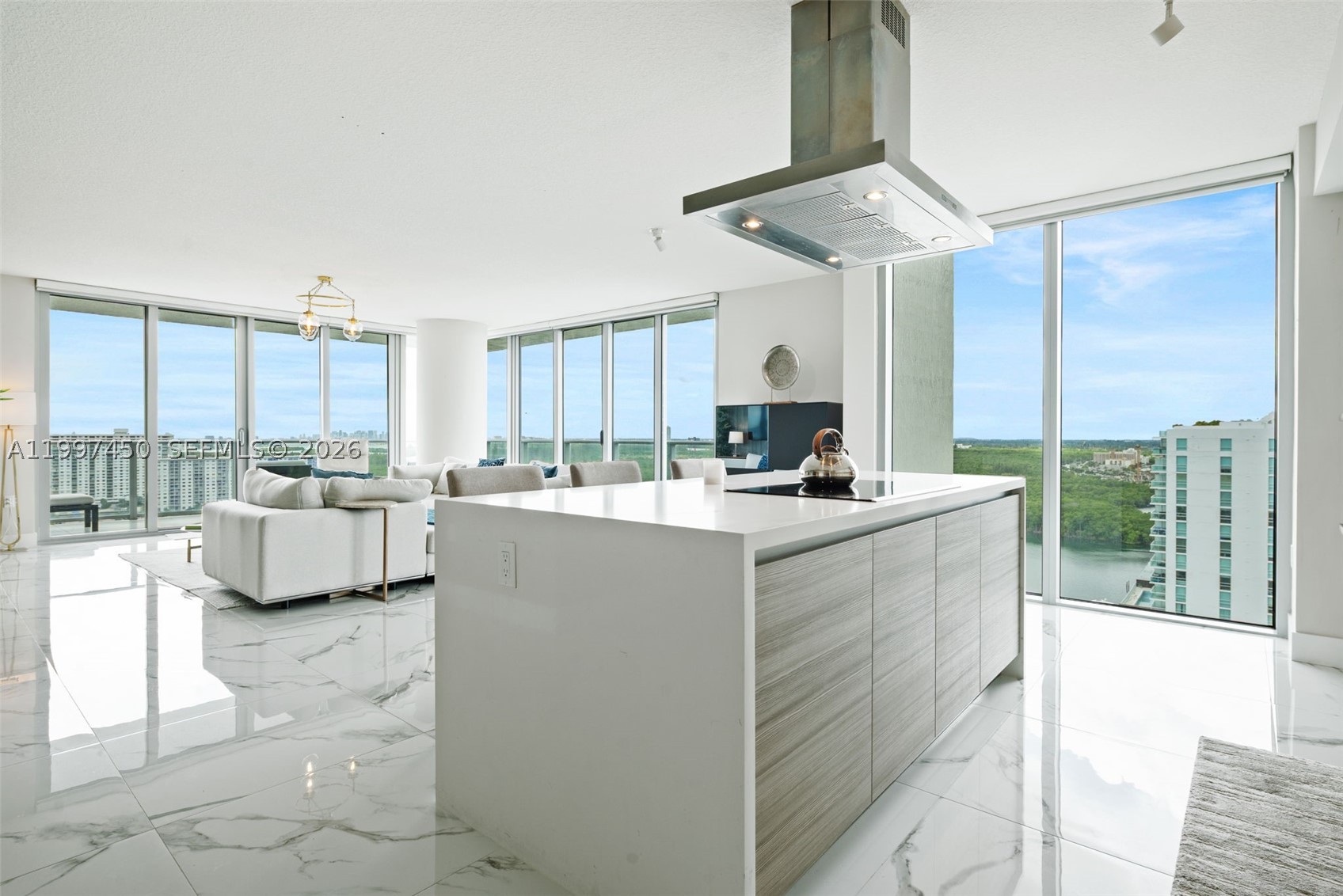 This fully furnished corner 3-bedroom, 3.5-bath residence at Parque Towers represents one of the most desirable lines in the building, offering approximately 1,900 SF of interior living space with a highly functional layout and expansive terraces. Positioned on a high floor, the residence enjoys panoramic sunrise and sunset views across the Intracoastal, bay, and the Downtown Miami skyline.

The home features a spacious open kitchen with Silestone countertops and premium Bosch appliances, seamlessly integrated into the main living area—ideal for both everyday living and entertaining. Additional highlights include porcelain flooring throughout, electric blinds, custom-built closets, and a generously sized balcony that extends the living space outdoors.

The primary suite offers a well-appointed bathroom with dual sinks and a soaking tub, along with ample closet space. The residence also includes two assigned parking spaces and a dedicated storage unit.

Parque Towers is a full-service luxury condominium offering resort-style amenities, including multiple pools, a state-of-the-art fitness center, and private beach club service, all ideally located in the heart of Sunny Isles Beach, just one block from the beach.