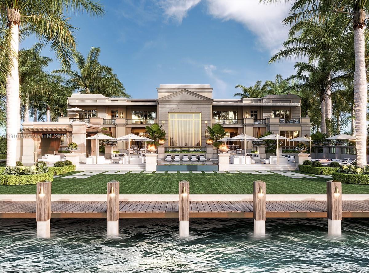 On one of the world’s most coveted addresses, Indian Creek, this 27,889 SF architectural masterpiece sits on an 80,000 SF lot with 200 feet of pristine waterfront. The estate’s plans and interiors were envisioned by world-renowned designer Ferris Rafauli. From the limestone façade and grand architectural proportions to the meticulously curated interiors, every detail showcases modern artistry and exceptional craftsmanship. A sweeping staircase beneath a 38-foot skylight creates a dramatic centerpiece, filling the home with natural light. This classically inspired residence offers endless views, indoor-outdoor living, and a sense of privacy and sophistication. A true expression of sculptural beauty, design, and enduring legacy, this estate defines the pinnacle of luxury waterfront living.