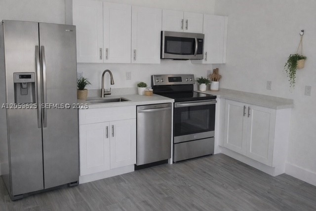 Consider it new!!!! Beautiful unit of this remodeled duplex in Little River / Little Haiti. 3 bedroom, 2 bathrooms. Stainless steel appliances. Wood floors. Blocks away from great developments. Restaurants, Coffee shops. Must see. Section 8 welcome. Move in with 1st month and Security Deposit.
