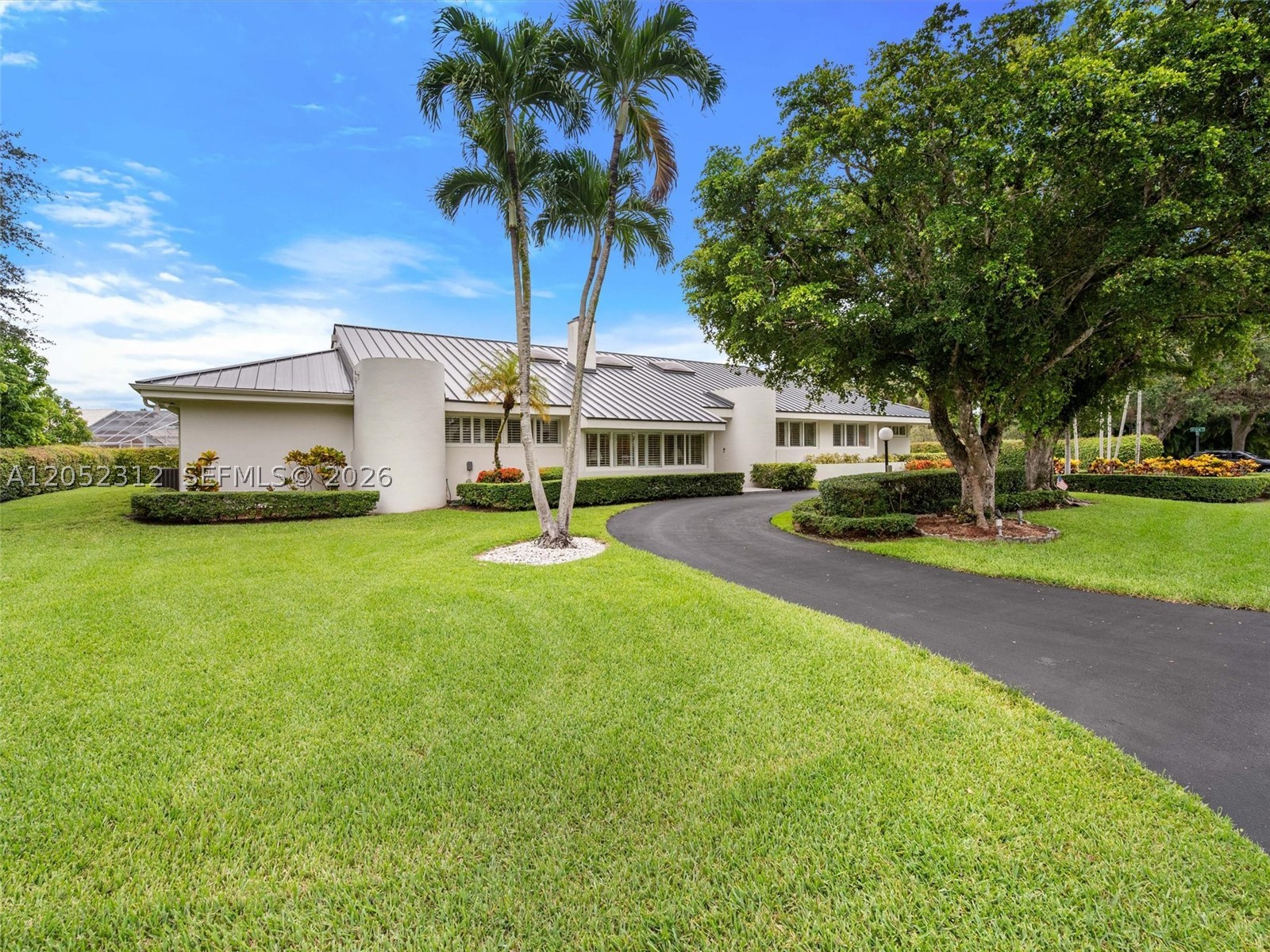 Rare opportunity to own this original-owner estate nestled on a beautifully landscaped half-acre canal-front lot in prestigious Galloway Glen Estates. This exceptional 5-bedroom, 4 full bath, 2 half bath pool home offers the perfect blend of privacy, space, and timeless appeal.
Major upgrades include a newer metal roof, impact windows and doors throughout, and impact skylights for added peace of mind. A circular driveway, oversized two-car garage, and mature tropical landscaping create outstanding curb appeal, while the backyard features a private pool overlooking the canal—perfect for relaxing or entertaining.
Lovingly maintained by its original owner, this is a rare opportunity to own one of Galloway Glen Estates’ finest properties, where residents enjoy the added peace of mind of private neighborhood security provided by the Florida Highway Patrol.