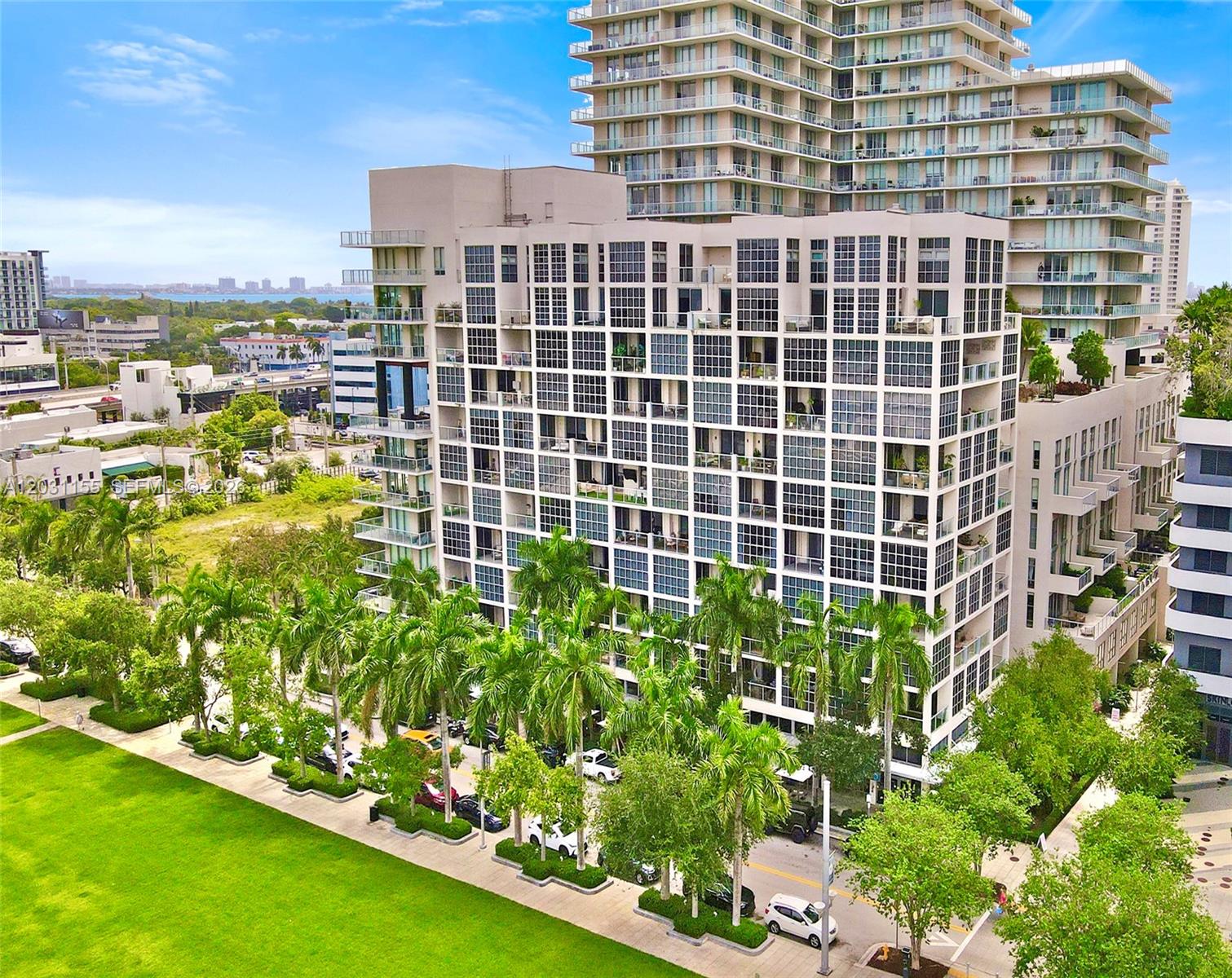 Own one of Midtown Miami's most distinctive live/work residences. Located in Midtown Miami, this exceptional three-story residence offers approximately 2,048 square feet of interior space plus a 405-square-foot private terrace, blending luxury living with flexibility for business or investment use.

The thoughtfully designed floor plan features 2 bedrooms, 2 full bathrooms, 2 half bathrooms, abundant natural light, and a versatile ground-floor commercial space ideal for a professional office, design studio, gallery, showroom, wellness practice, or entrepreneurial venture. Ideal as a primary residence, live/work space, or investment opportunity.

Step outside and enjoy one of Miami's most vibrant and walkable neighborhoods. Midtown Miami offers exceptional dining, shopping, fitness, and everyday conveniences. Trader Joe's, Whole Foods, Target, and some of Miami's most popular restaurants and boutiques are just steps away. Located minutes from the Miami Design District, Wynwood Arts District, Edgewater, Downtown Miami, Brickell, Museum Park, PortMiami, Brightline, Miami International Airport, and the world-famous beaches, dining, and nightlife of Miami Beach and South Beach.

Residents enjoy resort-style amenities including a fitness center, swimming pool, spa, sauna, steam room, concierge services, valet parking, and secure covered parking. Luxury, flexibility, and location combine to create an exceptional Miami lifestyle.