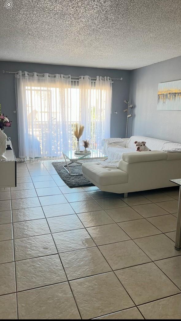 Prime Kendall location, across from Miami Dade College (104th Street Campus). A 1-bedroom, 1-bath condo with tile flooring, a remodeled kitchen, spacious closets, and a balcony. Offers a very functional layout with plenty of natural light. Enjoy the convenience of living. The pet-friendly community includes two dog parks and ample guest parking. Near a wide variety of restaurants, shopping centers, markets, schools, and businesses, along with easy access to major highways and roads.  An excellent opportunity for investors seeking a centrally located property in a highly desirable area. Rented until January 31, 2027, for $1,900 a month. Showing M-F after 6:00 pm. Weekend times vary and must be coordinated.