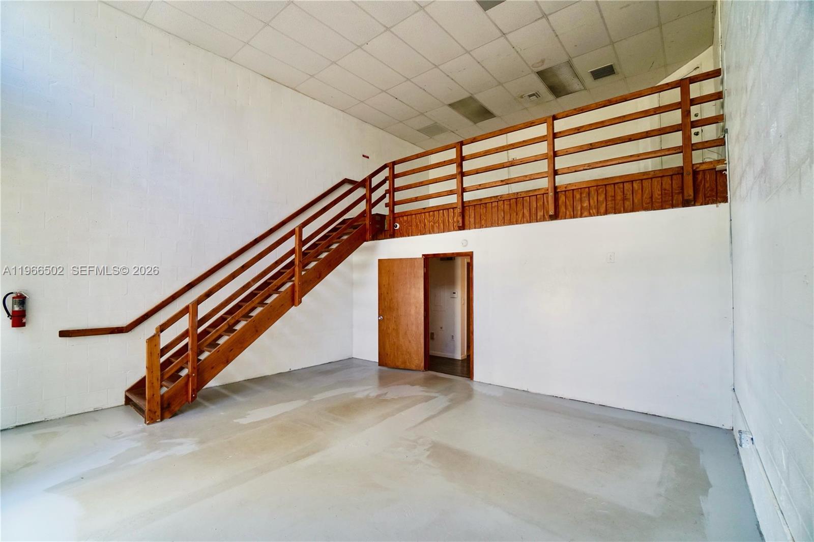 Excellent opportunity to own a versatile 560 sq ft office/warehouse combination in a prime location with easy highway access. This unit features high ceilings, an independent private office, and a second floor loft area, ideal for additional storage or workspace. Functional layout, offering flexibility for storage, late industrial use, or service based businesses. Perfect for owner-users or investors, seeking a well located commercial space.