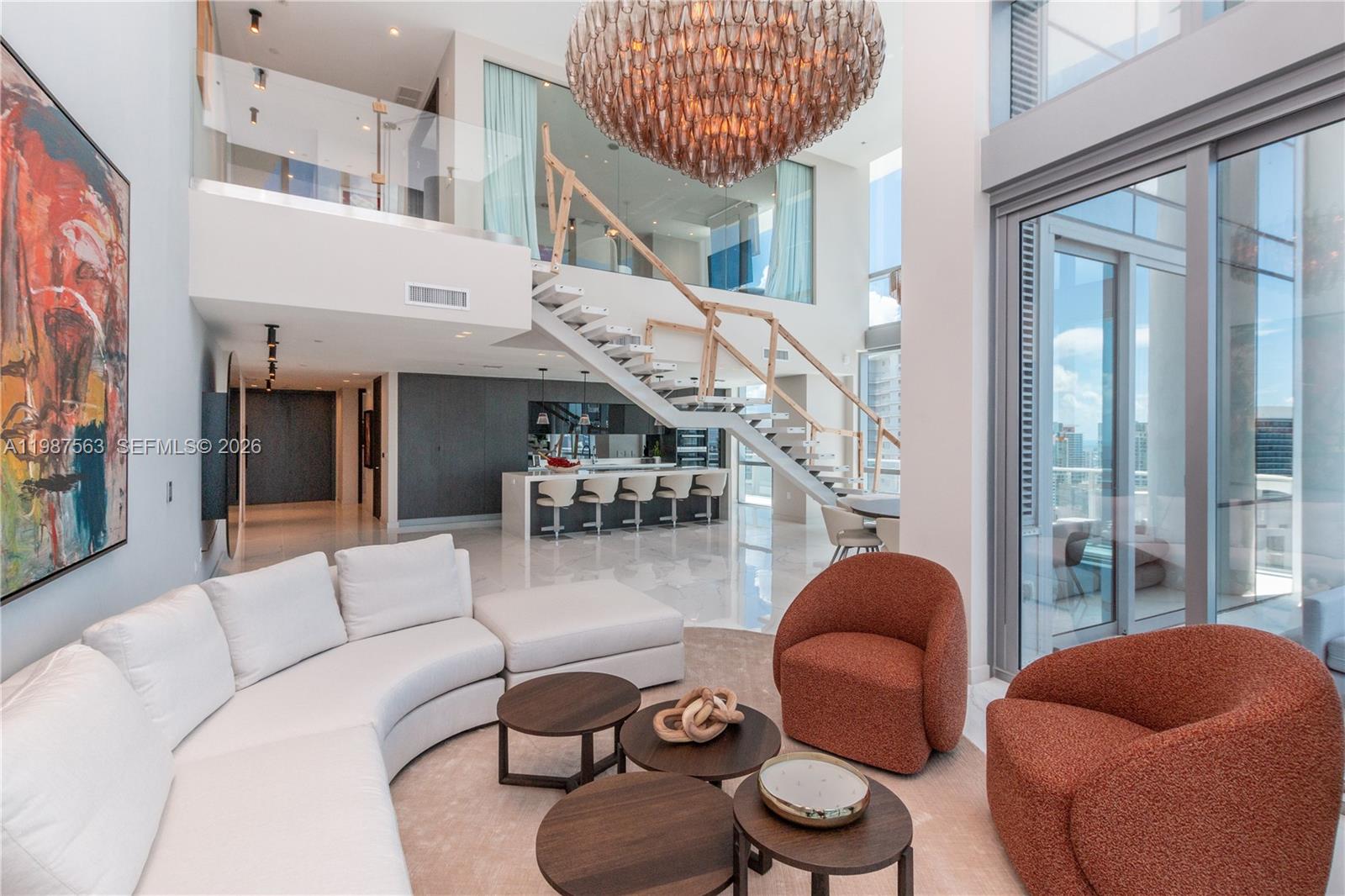 Discover Penthouse 4611, a 4,000 sq ft duplex sanctuary soaring above Downtown Miami, offering unparalleled sunrise-to-sunset panoramas over the Atlantic, Brickell and the city skyline. This 4-bedroom, 5.5-bath residence is fully turnkey, elegantly furnished with curated designer pieces from Artefacto and Modani, featuring sleek built-ins, frame TVs in every bedroom, smart Control4 automation and blackout shades for ultimate comfort and privacy.

Every detail has been crafted for indulgence: spa-like bathrooms with luxurious finishes, a home theater-inspired living space and expansive living areas perfect for entertaining or relaxing in style. Step outside to experience resort-style living with multiple pools, a skydeck observatory, children’s playground, tennis and soccer courts, a full-service spa, state-of-the-art fitness center with boxing and yoga studios, golf simulator, game and recreation rooms and even a private recording studio. Penthouse 4611 isn’t just a home, it’s a sky-high lifestyle where design, luxury and breathtaking views come together in a fully curated, move-in-ready masterpiece.