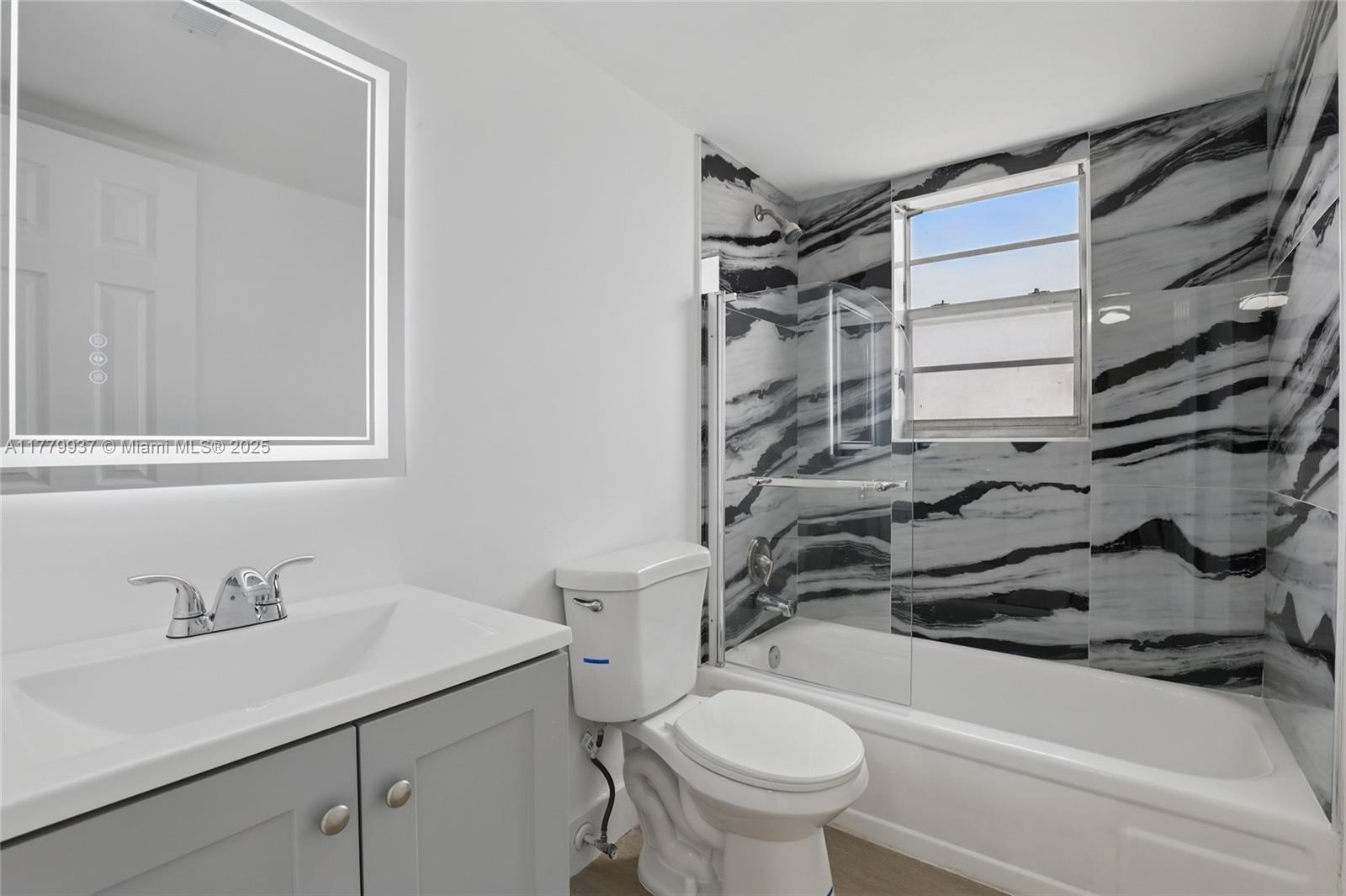 Fully Renovated 2-Bedroom, 2-Bathroom Corner Unit in Miramar, FL

This beautifully updated 2-bedroom, 2-bathroom corner unit in Miramar offers modern upgrades throughout, including a brand-new kitchen and bathrooms with sleek finishes. Enjoy elegant wood laminate flooring and plenty of natural light in every room. The spacious master features a walk-in closet, while a peaceful garden view adds tranquility. Additional perks include an in-unit washer and dryer, separate storage space, and a low monthly condo fee of just $411. With the option to lease after one year, this property is also an excellent investment opportunity. Don’t miss out on this move-in-ready gem—schedule a viewing today!
