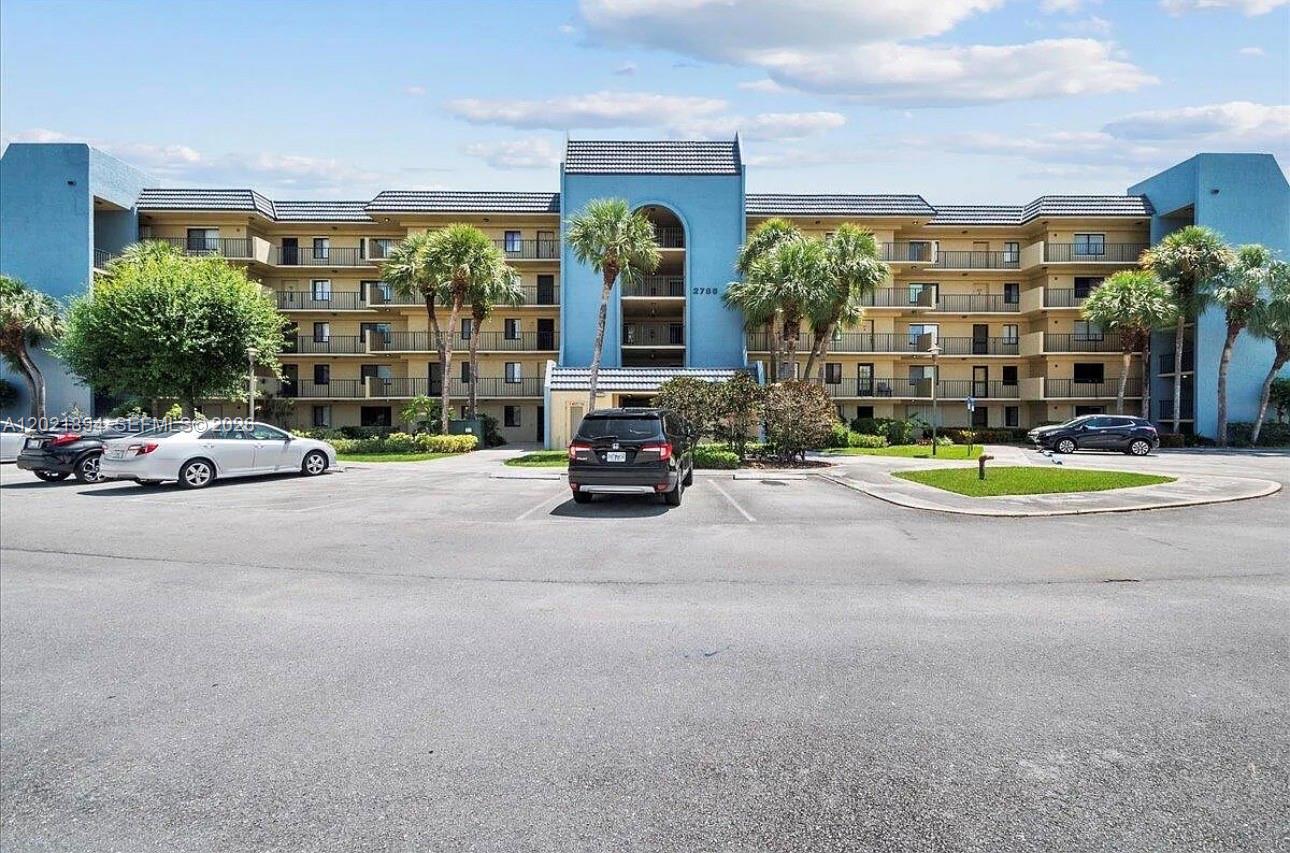 Investment opportunity ! Spacious 2-bedroom, 2-bath condo offering a bright and functional layout with open living and dining areas, private balcony, and abundant natural light throughout. The unit features laminate and tile flooring, an updated open-style kitchen, in-unit washer and dryer, generous storage space, and 1 assigned parking space. Excellent opportunity for investors or end users looking to personalize and add value over time. This amenity-rich tennis community offers resort-style living with multiple Har-Tru tennis courts, swimming pool, clubhouse, fitness center, picnic and green areas, social activities, and guest parking. Conveniently located near shopping, restaurants, Palm Beach Outlets, major highways, Palm Beach International Airport, schools, colleges, and beaches.Tenant occupied — 24-hour notice required for showings.