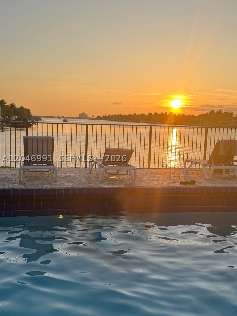 Rarely available — a beautifully updated 1BD/1BA in a gated waterfront community, and it comes with a deeded parking space, a true premium in Miami Beach.
This bright, move-in-ready residence features a spacious open living area, sleek porcelain tile flooring throughout, central A/C, and recessed lighting. The renovated galley kitchen offers white shaker cabinetry, granite countertops, stainless steel appliances, gas range, and a sunny rear entrance. The generous bedroom includes a full wall of mirrored built-in closets plus additional hallway storage — rare closet space for the era. The updated bathroom showcases marble-look tile and a walk-in rain shower.
Enjoy in-unit washer/dryer, hurricane shutters, and abundant natural light throughout.
Set on the bay within a secure, gated community offering various amenities: a bayfront pool with sun deck and unforgettable sunset water views, a private dock and picnic area, and lush tropical landscaping.
Steps from North Shore Open Space Park, the beach, Bal Harbour Shops, and Collins Avenue dining, with quick access to I-195 and Downtown Miami.
The deeded parking, in-unit laundry, hurricane protection, and prime waterfront setting make this one stand out.