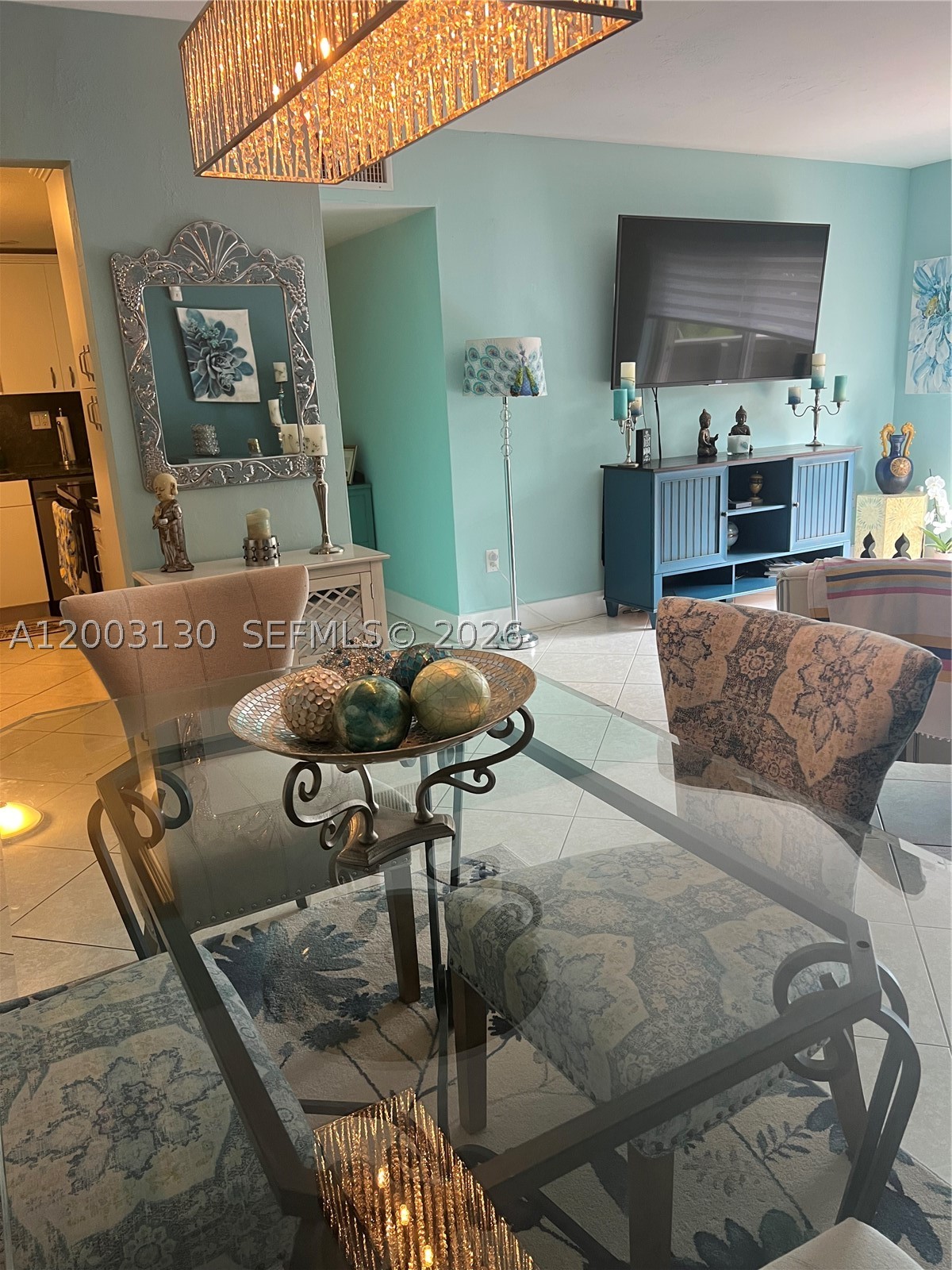 Beautifully updated 2 bed, 2 bath condo in the heart of Dadeland! This spacious second-floor unit features tile floors throughout, impact windows, and accordion shutters for peace of mind. Enjoy a bright kitchen with a new dishwasher and stainless-steel appliances. Primary suite offers comfort and style. Step outside to a large balcony overlooking lush green space—perfect for relaxing. Includes one assigned parking space conveniently located near the unit, with community pool and clubhouse for your enjoyment. Impeccably maintained—just bring your clothes and move right in!