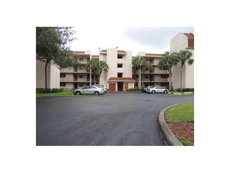 Don't miss this unit, fast approval, amazing condo on the first floor tile through the property with upgraded kitchen appliances, laundry room with upgraded washer and dryer. New a/c low electric bill, pool behind the condo, the community offers a gym, re staurants, bbq area and ball room that you can rent.