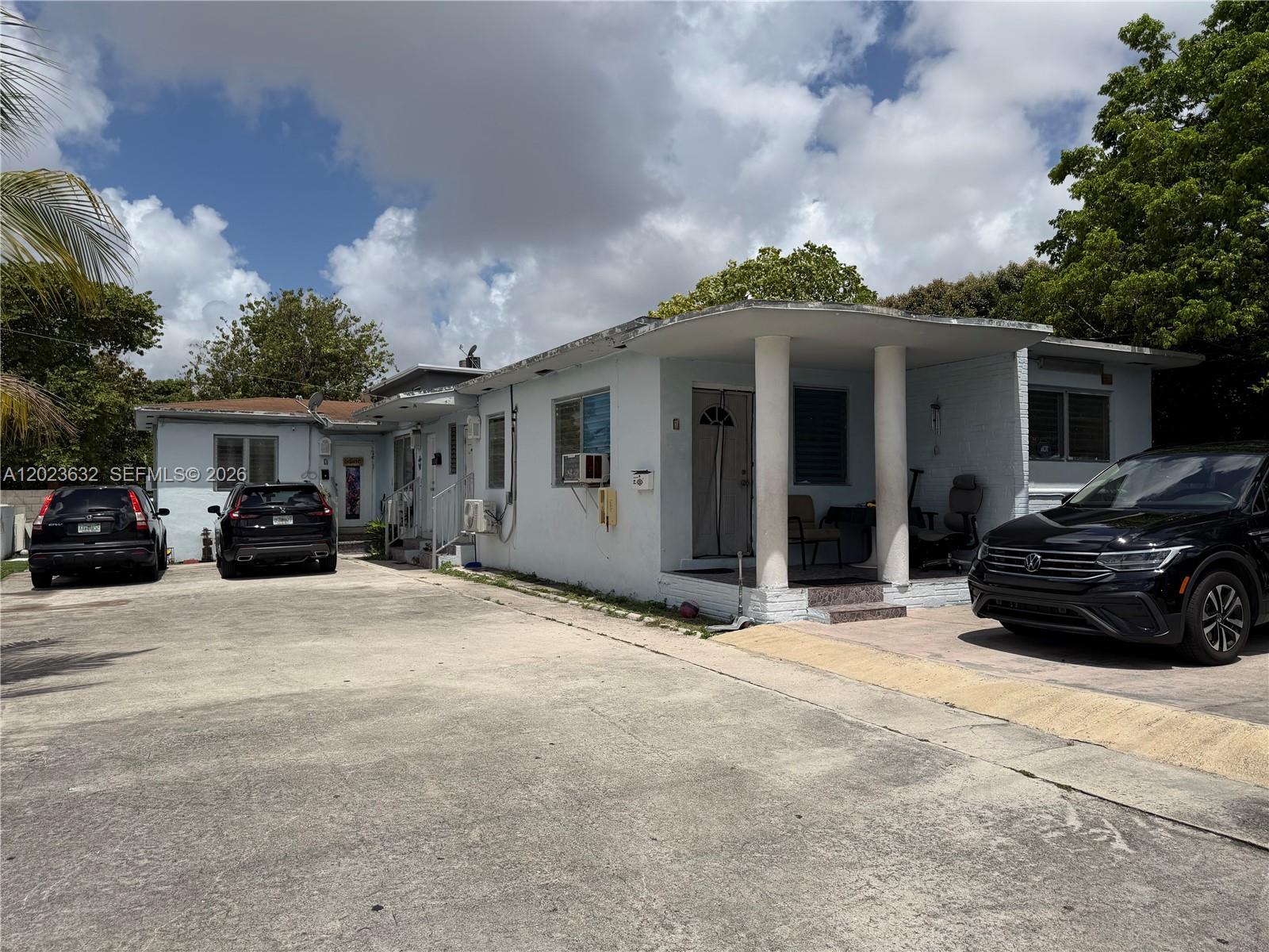 Income-producing triplex located in Miami featuring three residential units on a 6,500 sq ft lot. The property includes one 2-bedroom/1-bath unit and two 1-bedroom/1-bath units, all currently leased. Each unit includes tile flooring, central air conditioning, central heating, open parking, and kitchen appliances including an electric range and refrigerator.

The property offers CBS construction, a shingle roof, municipal water and sewer, and exterior features including a patio, open porch, fencing, and exterior lighting. Conveniently located near major roadways, shopping, dining, and everyday conveniences.

Great opportunity for investors seeking a multi-family property with existing rental income.