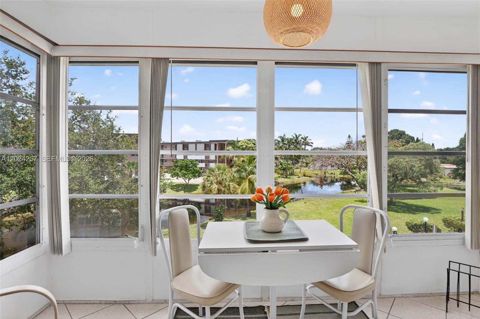 Immaculate and beautifully maintained 1-bedroom & 1-bathroom condo with one of the nicest water views in Lauderdale Oaks! Offered fully furnished and turnkey, this move-in-ready residence includes everything you need to start enjoying the Florida lifestyle immediately. Ideally located in desirable Building 6, away from street noise and just steps from the pool, this bright and quiet unit features tile flooring throughout, including newer flooring in the bedroom. The white kitchen and updated bathroom add to the home's clean and inviting appeal. Also new AC from 2023. Relax and unwind from your Florida Room, while taking in the serene scenery from the comfort of your home.  Located in the vibrant, HOPA-verified Lauderdale Oaks community, residents enjoy a lifestyle with a wide array of amenities and activities, including a fitness center, interior pickleball, bocce, shuffleboard, bingo, dances, three heated pools, a beautifully updated clubhouse, and much more. Priced to sell fast, Don't miss this opportunity!