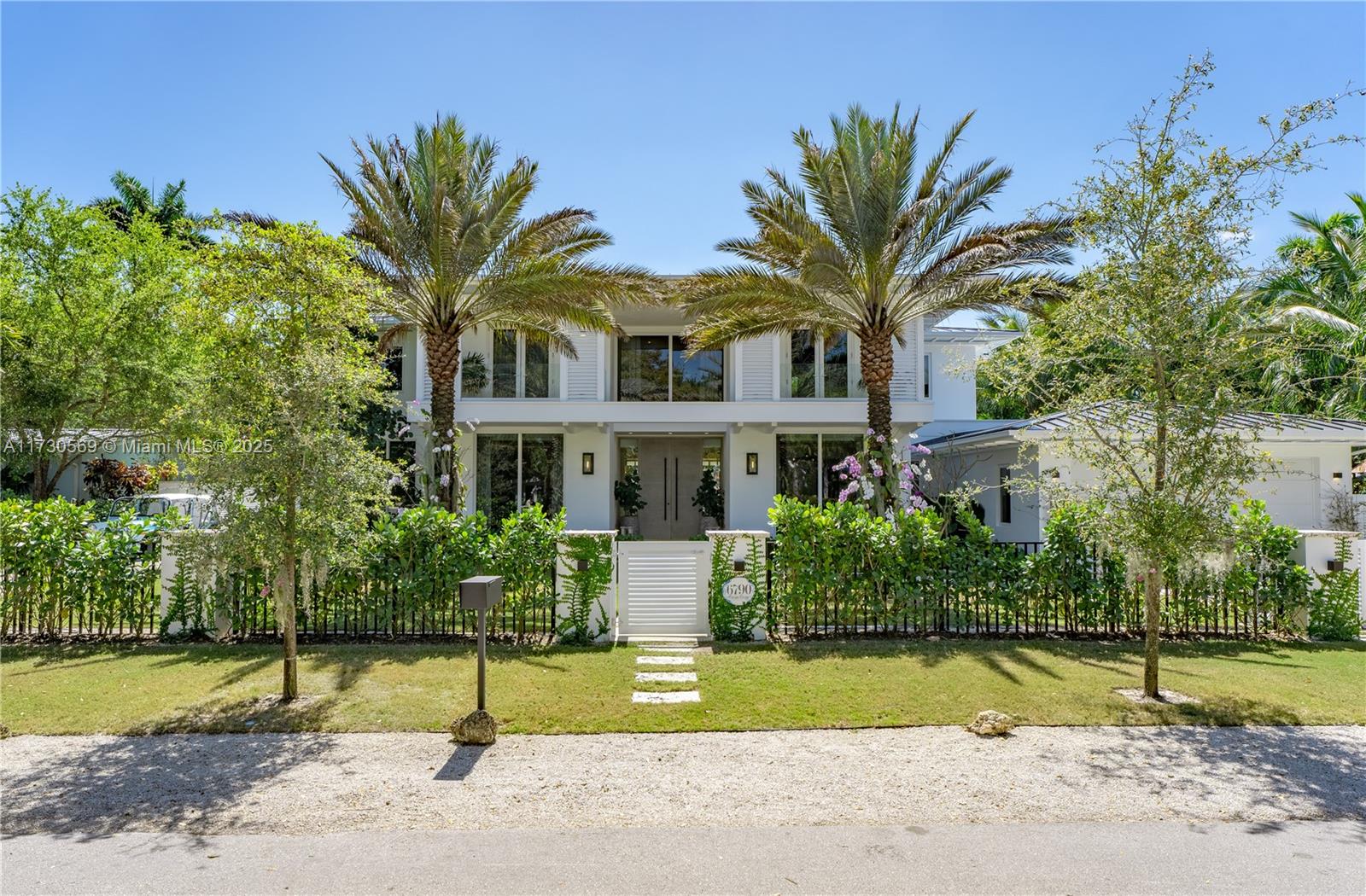 Turnkey designer finished home with 6,026 sq ft LA/7,187 ft total on a 15,448 sq ft lot.Custom furnishings throughout,Cedar Works playset,designer light fixtures and Baby Blue Moke Golf cart.Designed by awarded architects Balli Trautman & interior finishes by Cozy Salazar Interiors.One of a kind home in the heart of South Miami.Centrally located in Mango Terrace just a few blocks North of North Pinecrest,1 min from Gulliver and Downtown South Miami.Trimless lighting,48x48 porcelain tile and select oak wood floors,natural coral stone exterior.Chef's kitchen featuring Subzero,4 wolf ovens,Miele coffee maker, fridge/freezer drawers and 5ft Galley Sink.Spa Master with waterworks plumbing & floor to ceiling Calcite Azul marble slabs. Heated saltwater pool & 65kw generator with 1000gal gas tank.