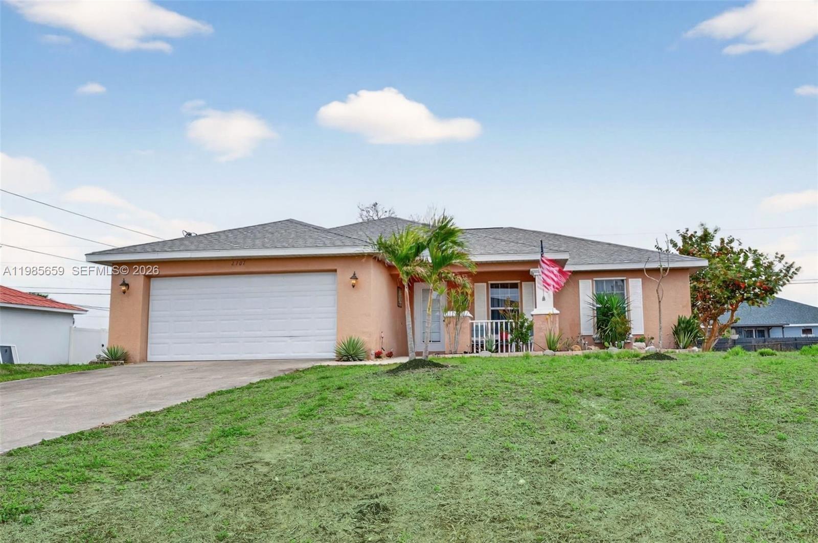 Welcome to this spacious 3BR, 2BA home with a DEN in a great Cape Coral location. Thoughtfully designed with an open-concept layout, VAULTED ceilings, and SPLIT-bedroom floorplan, this home offers both privacy and functionality—guest bedroom features direct access to full bathroom. This property is NOT in a special flood zone, NO HOA and offers plenty of room for a future pool. A dedicated dining area flows seamlessly into the living room, making entertaining effortless. The TRIPLE glass door SLIDERS open wide to a covered, screened patio with a ceiling fan. Recent updates include:•New roof (2023) • New A/C (2023) & just  PROFESSIONALLY CLEANED AC DUCTS & DRYER VENT • New water softener (2023) • Well pump (2022) • New DURABLE WATERPROOF wood look flooring (2024) in all bedrooms and the den • New HEAVY DUTY patio screen and ceiling. The kitchen features STAINLESS STEEL appliances, including a newer refrigerator (2023), dishwasher, microwave, and stove/oven (2021), plus a REVERSE OSMOSIS system under the SINK (2023). Tile flooring runs through the main living areas NO CARPET. The home has been well maintained with many major updates already completed. Prime Cape Coral location near major roads, shopping, and dining. Minutes from beaches, boat ramps, and outdoor recreation. Convenient to schools, parks, and medical facilities. Live close to everything—restaurants, retail, parks, and waterfront activities—while still enjoying the comfort of a residential neighborhood