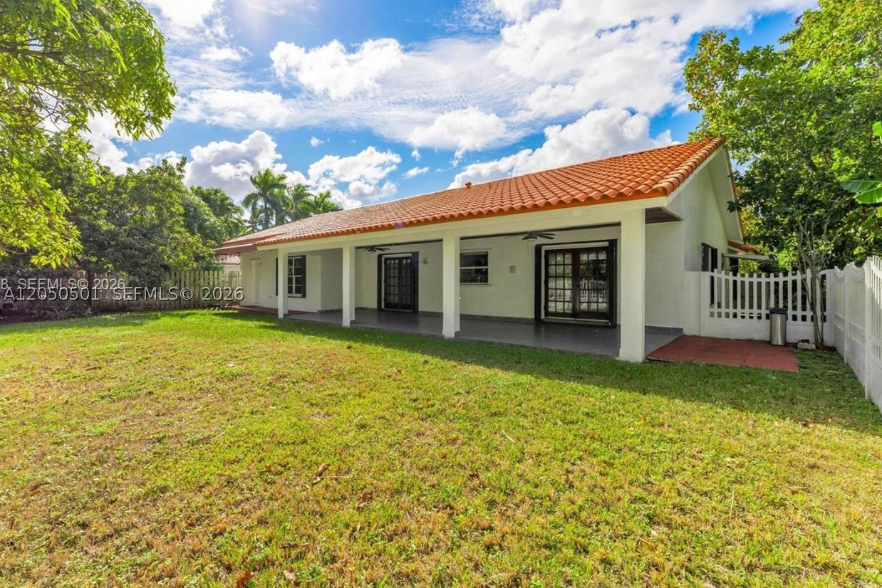 Spacious waterfront single-family home in the desirable Bird Lakes community, situated on an oversized lot with approximately 2,700 total square feet, including the two-car garage. This 3-bedroom, 2-bath residence features an open floor plan with high ceilings, formal living and dining areas, a large family room, and tile flooring throughout. The spacious primary suite offers a walk-in closet and an en-suite cabana bath. The open kitchen with a center island is perfect for everyday living and entertaining. Enjoy a fully fenced backyard with a large covered terrace overlooking the lake, plus plenty of room to build your dream pool. Additional features include a durable Spanish concrete tile roof, hurricane shutters, and no HOA. Ideally located near major highways, hospitals, top-rated schools, shopping, and dining. Seller financing available at an attractive 4% interest rate.