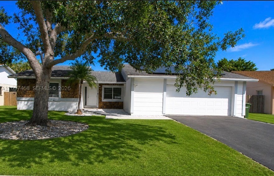 Energy-Efficient home with impacts windows and private in-law quarters! Welcome to this beautiful home located in one of Homestead's most desirable communities. The house has abundant natural light and an open layout, ideal for entertaining. This home features a 2.5 car garage, offering plenty of room for two vehicles plus extra space. High impact windows to provide enhanced storm protection and insurance savings. Featuring owned solar panels, this property offers the opportunity to enjoy lower electric bills while embracing a more sustainable lifestyle. One of the standout features is the private in-law quarters, offering a flexible space for family, guests, or potential income. Spacious yard with space for all your toys. For a small association fee, enjoy the perks of a clubhouse with pool, gym, playground, dog park, basketball court and much more! Conveniently located near schools, shopping, dining, hospitals, and just five minutes from the Florida Turnpike. This exceptional residence has it all!