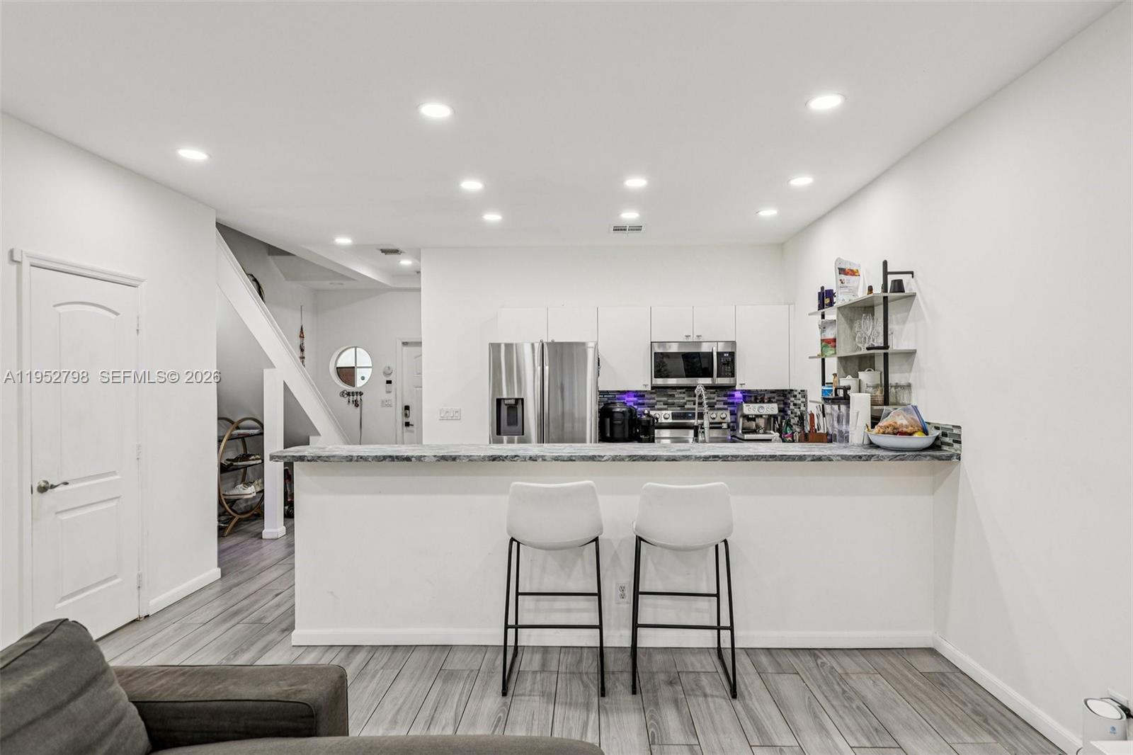 Welcome home to a recently remodeled, furnished 3BR/2.5BA, 1,580 SF townhome in Tuscan View, a boutique 8-unit community in the heart of Hollywood. Enjoy a bright, open layout, a private patio, and a garage converted to storage and a home gym. Recharge in your built-in infrared sauna and enjoy peace of mind with a home security system. An EV charging station makes it ideal for Tesla (or any EV) owners. The primary suite features an ensuite bath, while the two guest bedrooms share a Jack-and-Jill bathroom with direct access from each room. Ideally located near Downtown Hollywood/Young Circle and the beach, with close proximity to Aventura Mall, Hard Rock Casino, Fort Lauderdale–Hollywood International Airport, and just minutes to I-95.