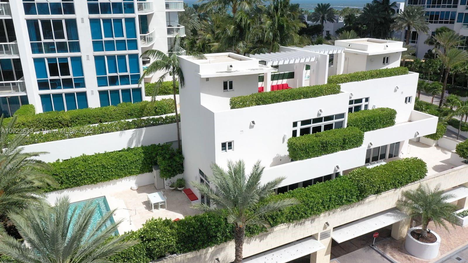 This is literally a one of a kind loft at The Continuum, combining sophistication with a hint of playfulness. Enjoy all the benefits of a single family home with all the convenience of condo living. 3,360 SF living area, plus 4,511 SF of outdoor space, private pool & Jacuzzi. Experience sunny afternoons, starlit nights, and precious privacy. This special home has its own entrance, high-end finishes, full smart home package, white marble custom kitchen, 2 laundries, additional office on top floor with full bath. Outdoor space landscaped & artfully lit for maximum effect day & night. 5 parking spaces. Enjoy over 1000 ft of pristine beachfront. Continuum South Beach has incomparable amenities.