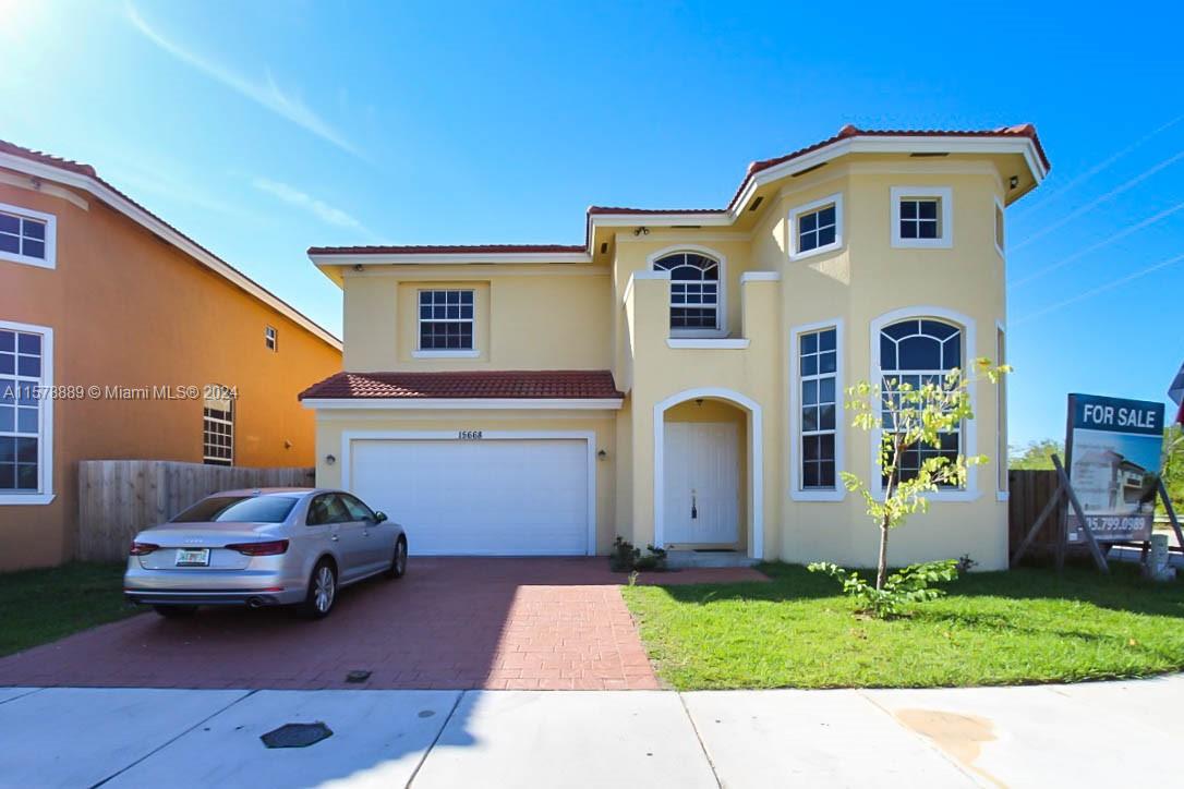 Beautiful NEWLY constructed elegant and contemporary 4 bedroom /3 bathroom home. Corner lot. Grand 14ft ceiling. Dazzling porcelain floors, featuring modern touches, top of the line appliances, walk-in closets, no details were spared. This a family-friendly enclave in an ideal location near the FL Turnpike, restaurants, shopping outlets and A+ school.