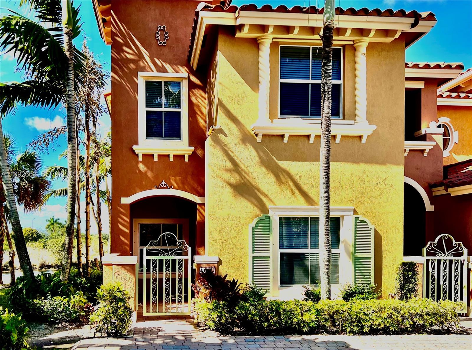 Beautiful corner unit with canal views in a sought-after gated community! this spacious home features  stainless steel appliances and upgraded wood-look vinyl flooring throughout- durable, waterproof, and perfect for everyday living. Enjoy a prime location within walking distance to Pembroke Gardens, offering shopping, dining, and weekend events just steps away. Convenient located near major expressways, making commuting quick and easy. The community is well- maintained, modern, and secure-ideal for comfortable living. This property combines location, upgrades, and lifestyle. A great opportunity you don't want to miss!