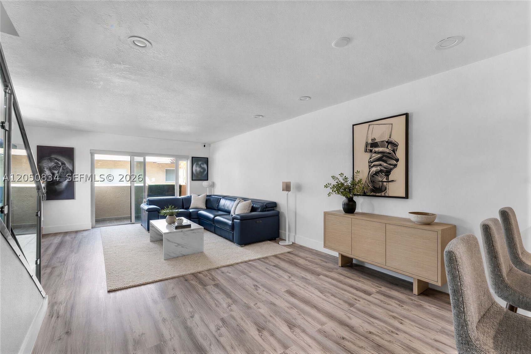 Beautifully renovated 2 bedroom, 2 bath condo offering 1,026 sq. ft. of stylish, move-in-ready living in the desirable Puerta Del Sol community. This thoughtfully updated residence features a modern kitchen, wood-look luxury vinyl flooring, elegant glass interior railings, updated bathrooms, and an in-unit washer and dryer. The spacious primary bedroom includes a private balcony, creating the perfect place to unwind. Enjoy the convenience of assigned parking and a pet-friendly community. The HOA includes water, and there are no current special assessments, providing added value and peace of mind. Ideally located in the heart of Kendall, just minutes from shopping, dining, parks, top-rated schools, and major highways. Don’t miss this opportunity to own a beautifully updated condo in one of Miami’s most convenient locations.